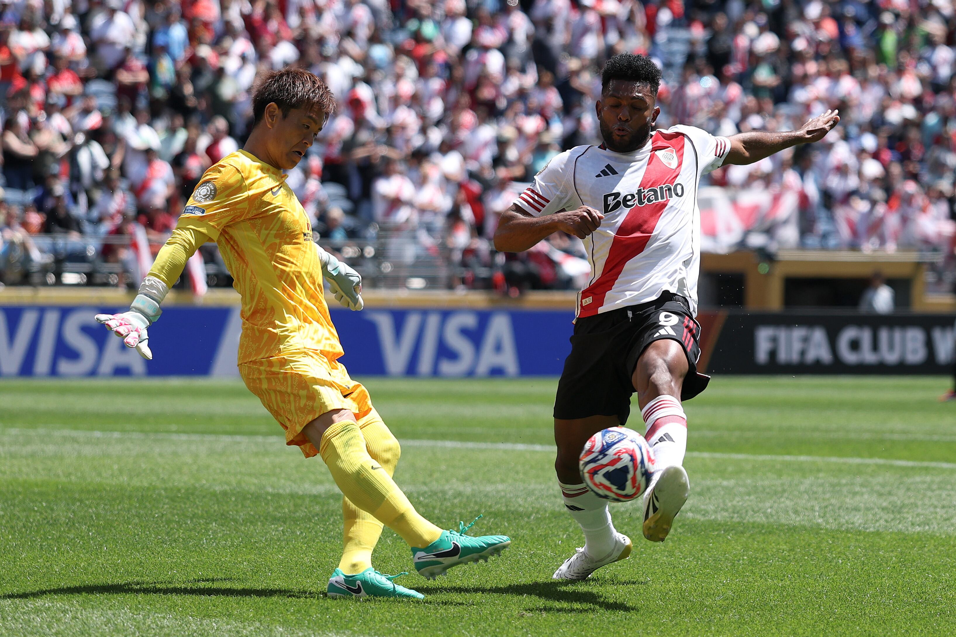 Miguel Borja #9 of River Plate is challenged by Shusaku Nishikawa #1 of Urawa Red Diamonds during the FIFA Club World Cup 2025 group E, at Lumen Field of Seattle, Washington.
