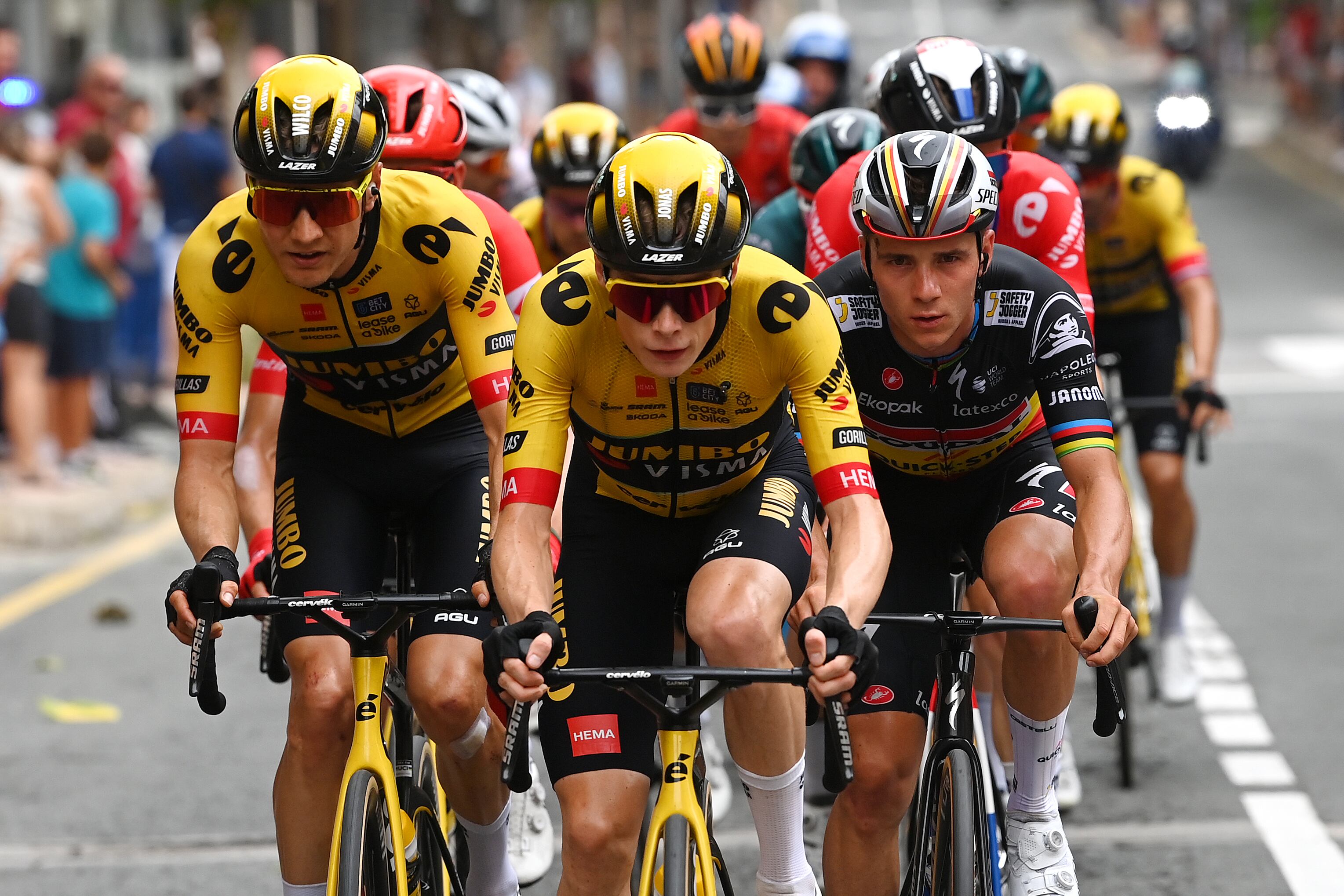 CARAVACA DE LA CRUZ, SPAIN - SEPTEMBER 03: (L-R) Wilco Kelderman of The Netherlands, Jonas Vingegaard of Denmark and Team Jumbo-Visma and Remco Evenepoel of Belgium and Team Soudal - Quick Step compete in the breakaway during the 78th Tour of Spain 2023, Stage 9 a 184,5 stage from Cartagena to Collado de la Cruz de Caravaca 1089m / #UCIWT / on September 03, 2023 in Collado de la Cruz de Caravaca, Spain. (Photo by Alexander Hassenstein/Getty Images)