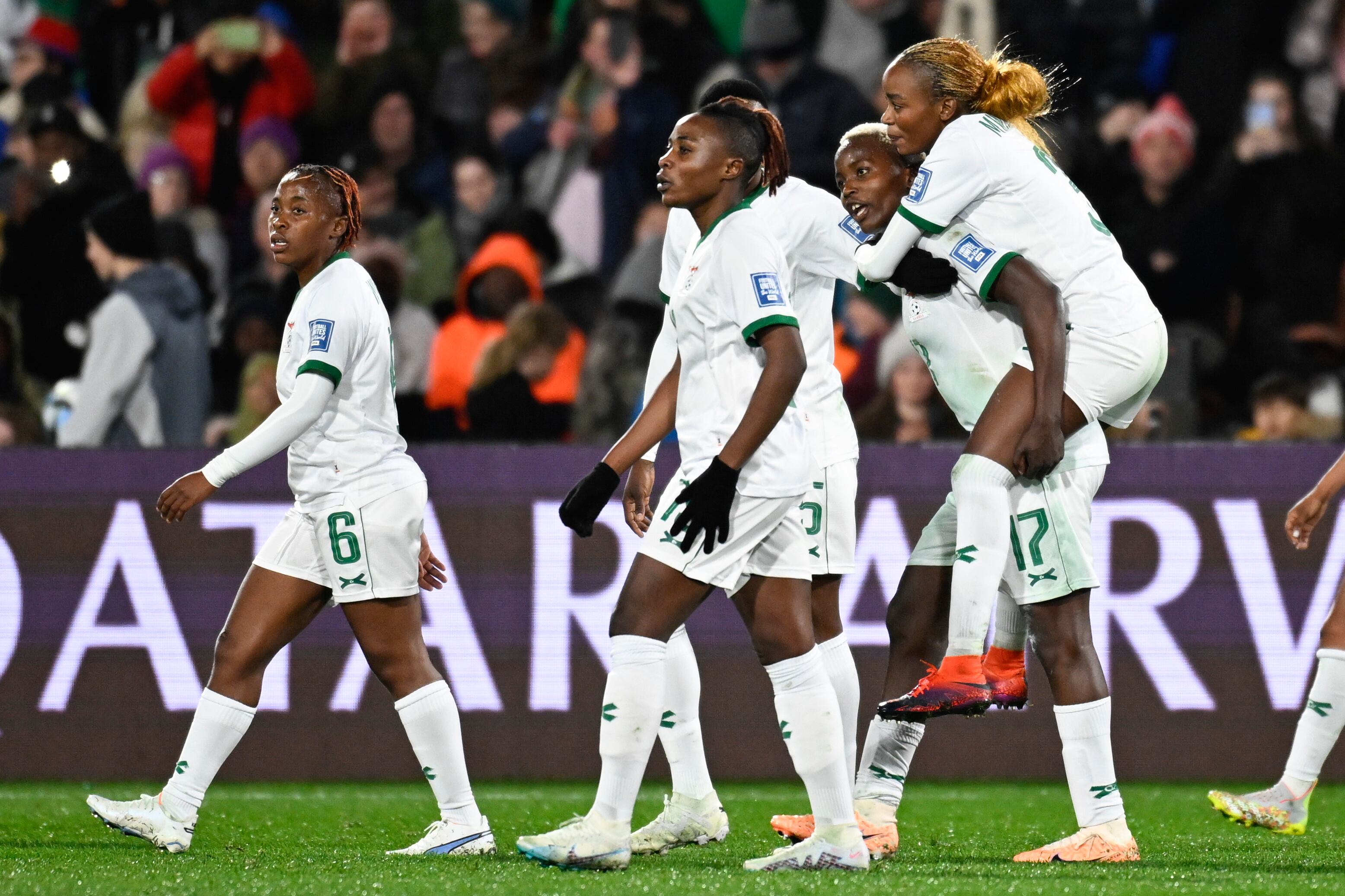 Zambian players celebrate after their third goal during the Women's World Cup Group C soccer match between Costa Rica and Zambia in Hamilton, New Zealand, Monday, July 31, 2023. (AP Photo/Andrew Cornaga)