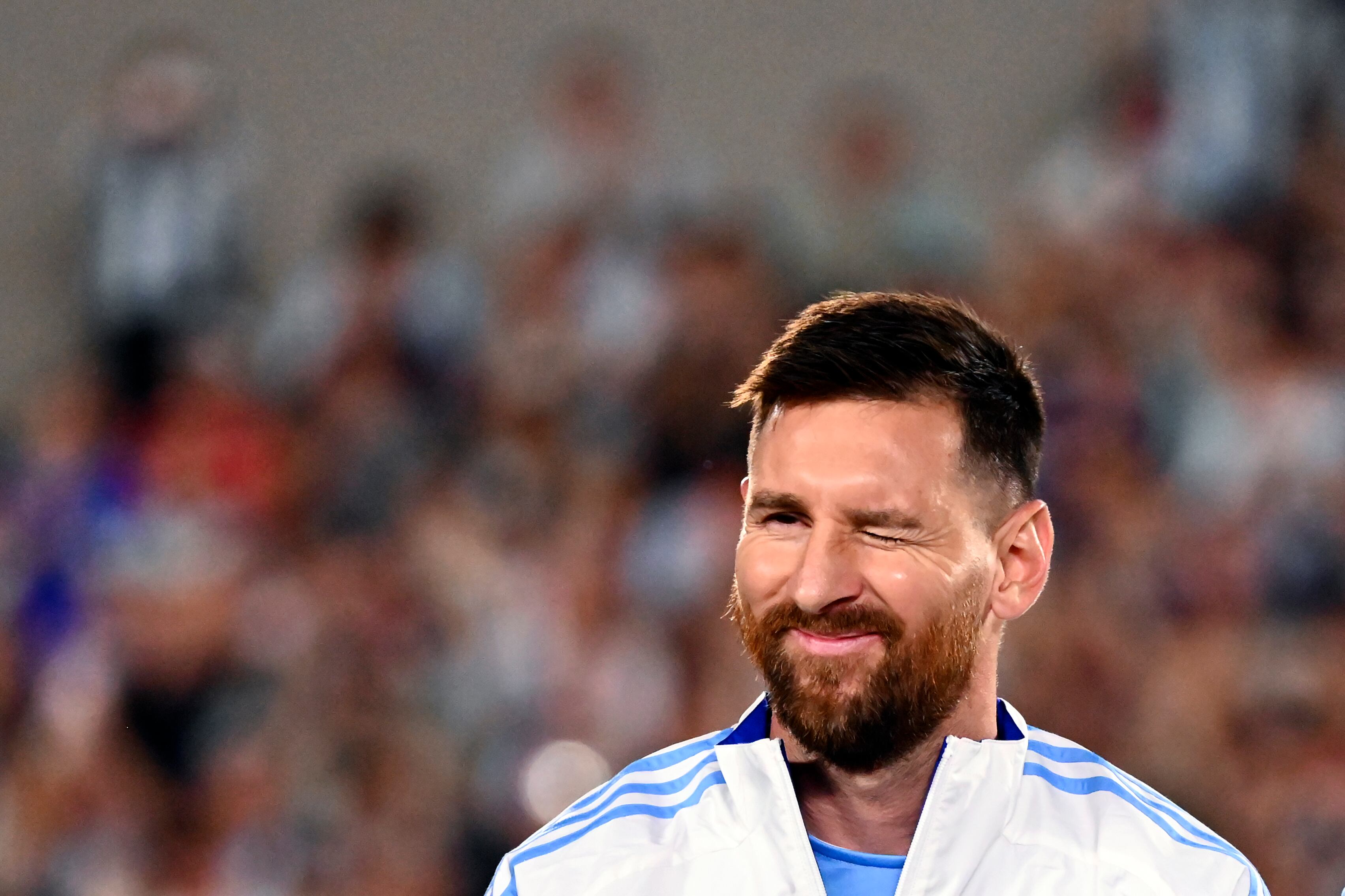 BUENOS AIRES, ARGENTINA - OCTOBER 15: Lionel Messi of Argentina winks prior to a FIFA World Cup 2026 Qualifier match between Argentina and Bolivia  at Estadio Más Monumental Antonio Vespucio Liberti on October 15, 2024 in Buenos Aires, Argentina. (Photo by Rodrigo Valle/Getty Images)