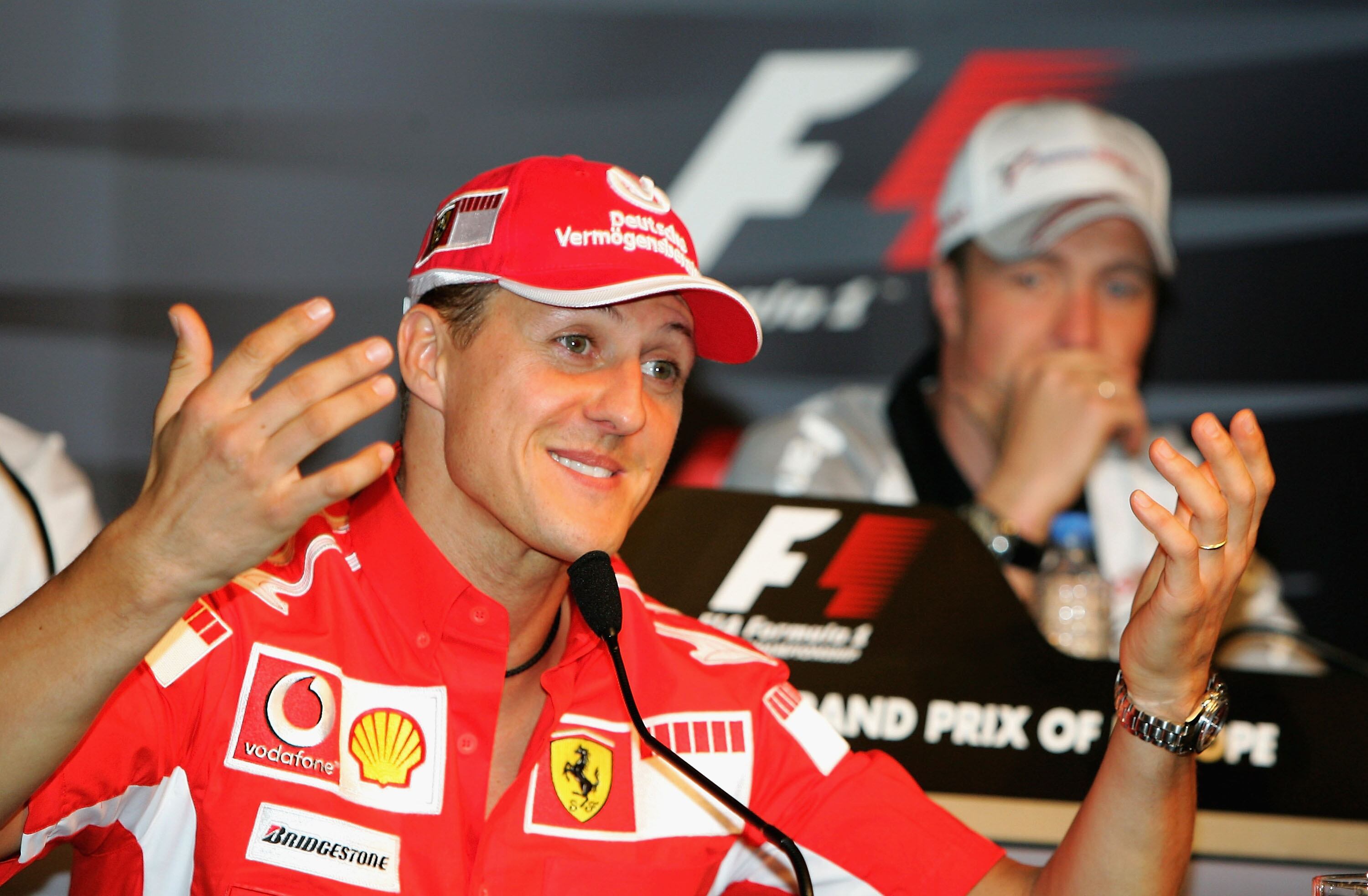 NURBURG, GERMANY - MAY 26:  Michael Schumacher (L) of Germany and Ferrari and Ralf Schumacher (R) of Germany and Toyota gesture during the press conference ahead of the European Formula One Grand Prix on May 26, 2005 in Nurburg, Germany  (Photo by Andreas Rentz/Bongarts/Getty Images)
