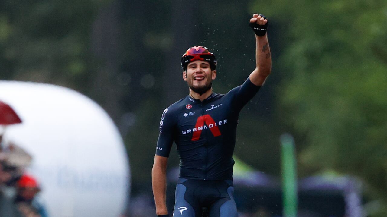 Team Ineos rider Italy's Filippo Ganna celebrates as he crosses the finish line to win the 5th stage of the Giro d'Italia 2020 cycling race, a 140-kilometer route between Mileto and Camigliatello Silano, on October 7, 2020. (Photo by Luca Bettini / AFP)