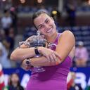 Aryna Sabalenka, of Belarus, hugs the trophy after winning the women's singles final of the U.S. Open tennis championships against Jessica Pegula, of the United States, , Saturday, Sept. 7, 2024, in New York. (AP Photo/Frank Franklin II)