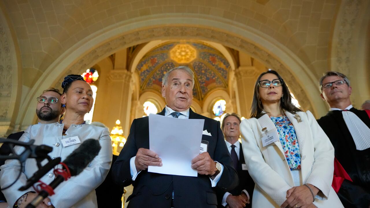 Colombia's agent Eduardo Valencia Ospina, center, and his delegation give a statement at the World Court in The Hague, Netherlands, Thursday, July 13, 2023, where the United Nations' top court rejected a case brought by Nicaragua in a decades-long maritime and sovereignty dispute in the Caribbean with neighboring Colombia. (AP Photo/Peter Dejong)