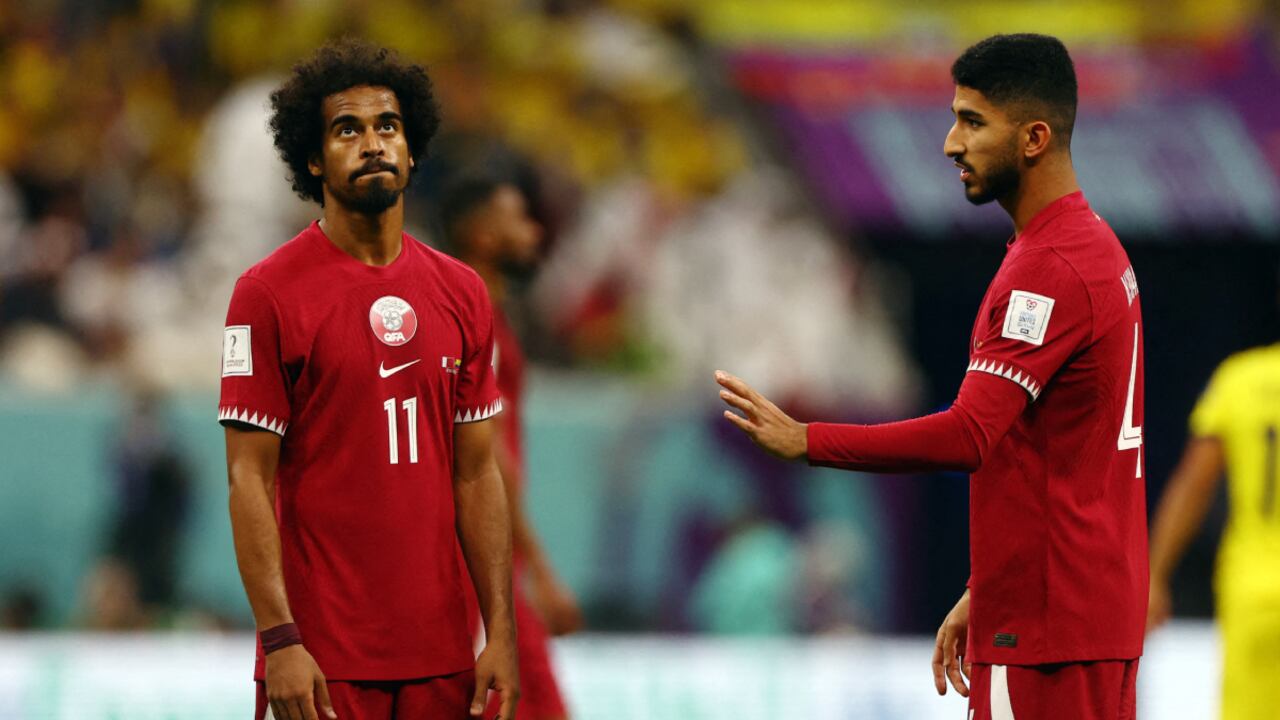 Soccer Football - FIFA World Cup Qatar 2022 - Group A - Qatar v Ecuador - Al Bayt Stadium, Al Khor, Qatar - November 20, 2022 Qatar's Akram Afif looks dejected REUTERS/Kai Pfaffenbach