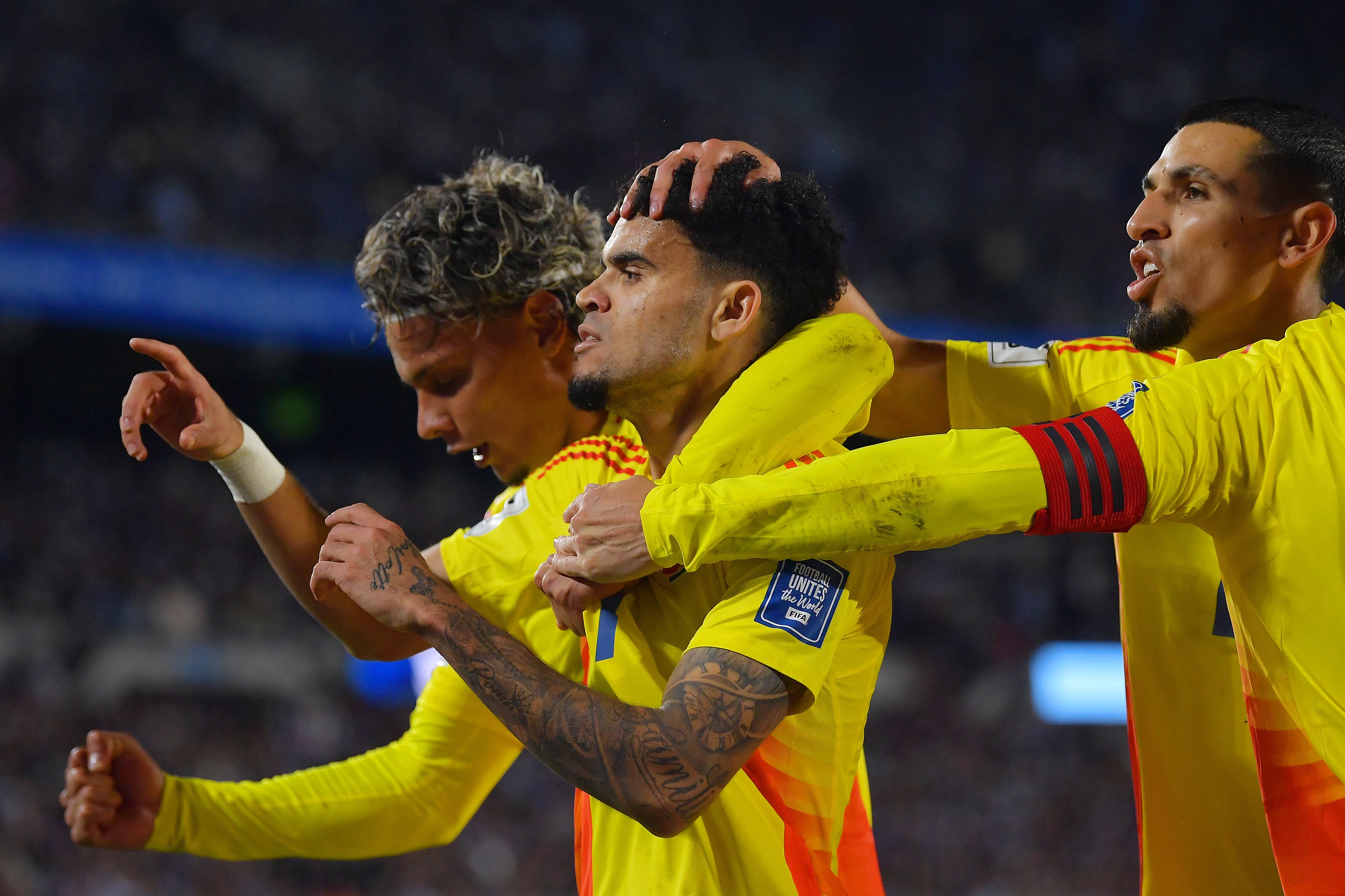 BUENOS AIRES, ARGENTINA - JUNE 10: Luis Diaz of Colombia celebrates with teammates after scoring the team's first goal during the FIFA World Cup 2026 South American Qualifier match between Argentina and Colombia at Estadio Más Monumental Antonio Vespucio Liberti on June 10, 2025 in Buenos Aires, Argentina.  (Photo by Marcelo Endelli/Getty Images)