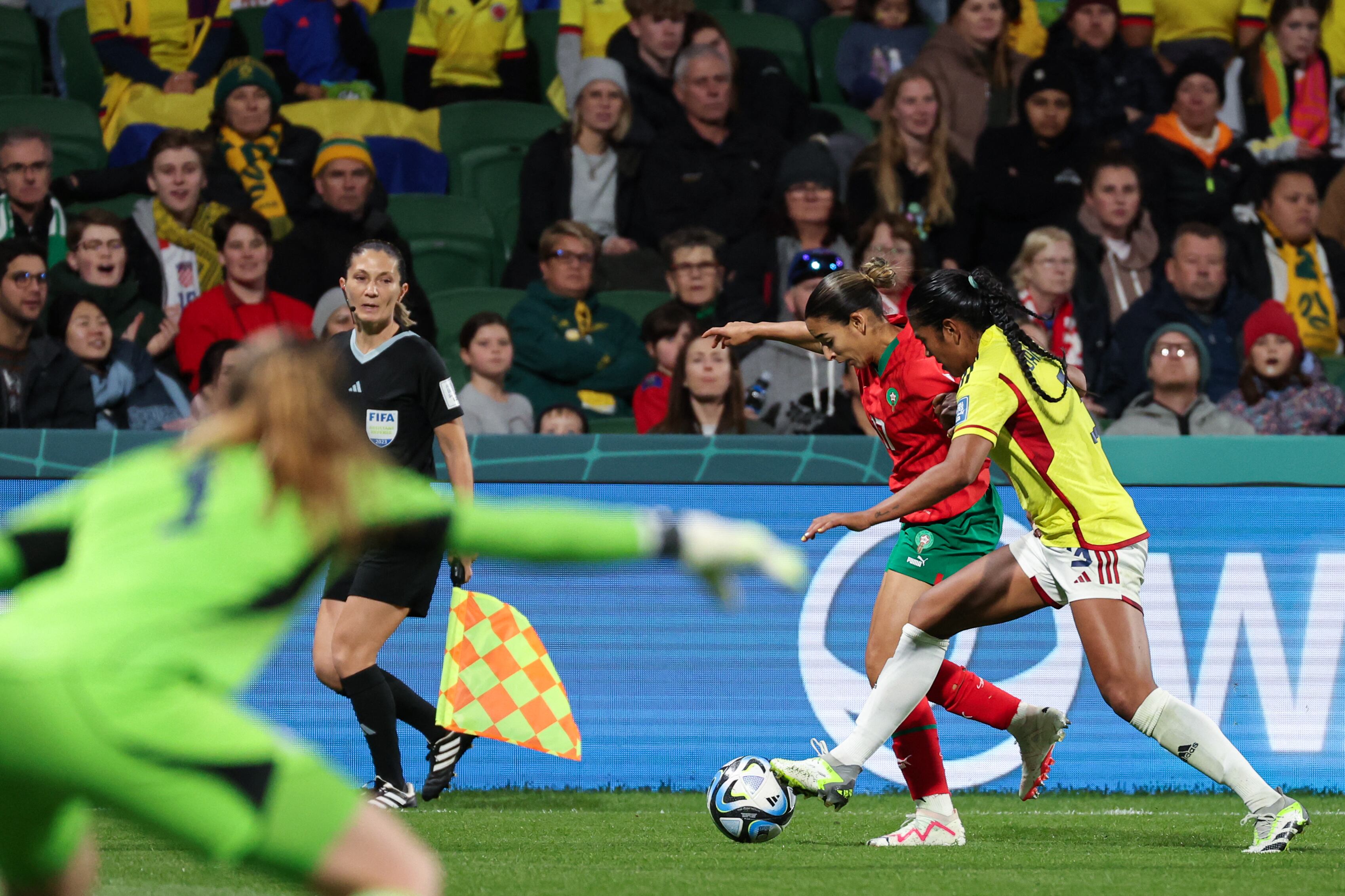 Colombia's defender #03 Daniela Arias (R) and Morocco's forward #07 Ghizlane Chebbak fight for the ball during the Australia and New Zealand 2023 Women's World Cup Group H football match between Morocco and Colombia at Perth Rectangular Stadium in Perth on August 3, 2023. (Photo by Colin MURTY / AFP)