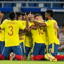 Players of Colombia celebrate after Miguel Borja secured his side's second goal against Chile during a qualifying soccer match for the FIFA World Cup Qatar 2022 in Barranquilla, Colombia, Thursday, Sept. 9, 2021. (AP Photo/Fernando Vergara)