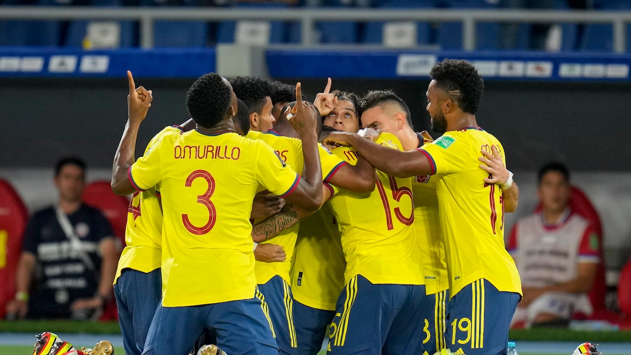 Players of Colombia celebrate after Miguel Borja secured his side's second goal against Chile during a qualifying soccer match for the FIFA World Cup Qatar 2022 in Barranquilla, Colombia, Thursday, Sept. 9, 2021. (AP Photo/Fernando Vergara)