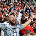 England supporters celebarate their opening goal during the UEFA EURO 2020 round of 16 football match between England and Germany at Wembley Stadium in London on June 29, 2021. (Photo by JUSTIN TALLIS / POOL / AFP)
