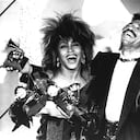 FILE - Tina Turner, left, and Lionel Richie pose with a total of five awards between them, at the Grammy Awards show in Los Angeles on Feb. 27, 1985. Turner, the unstoppable singer and stage performer, died Tuesday, after a long illness at her home in Küsnacht near Zurich, Switzerland, according to her manager. She was 83. (AP Photo/Lennox McLendon, File)