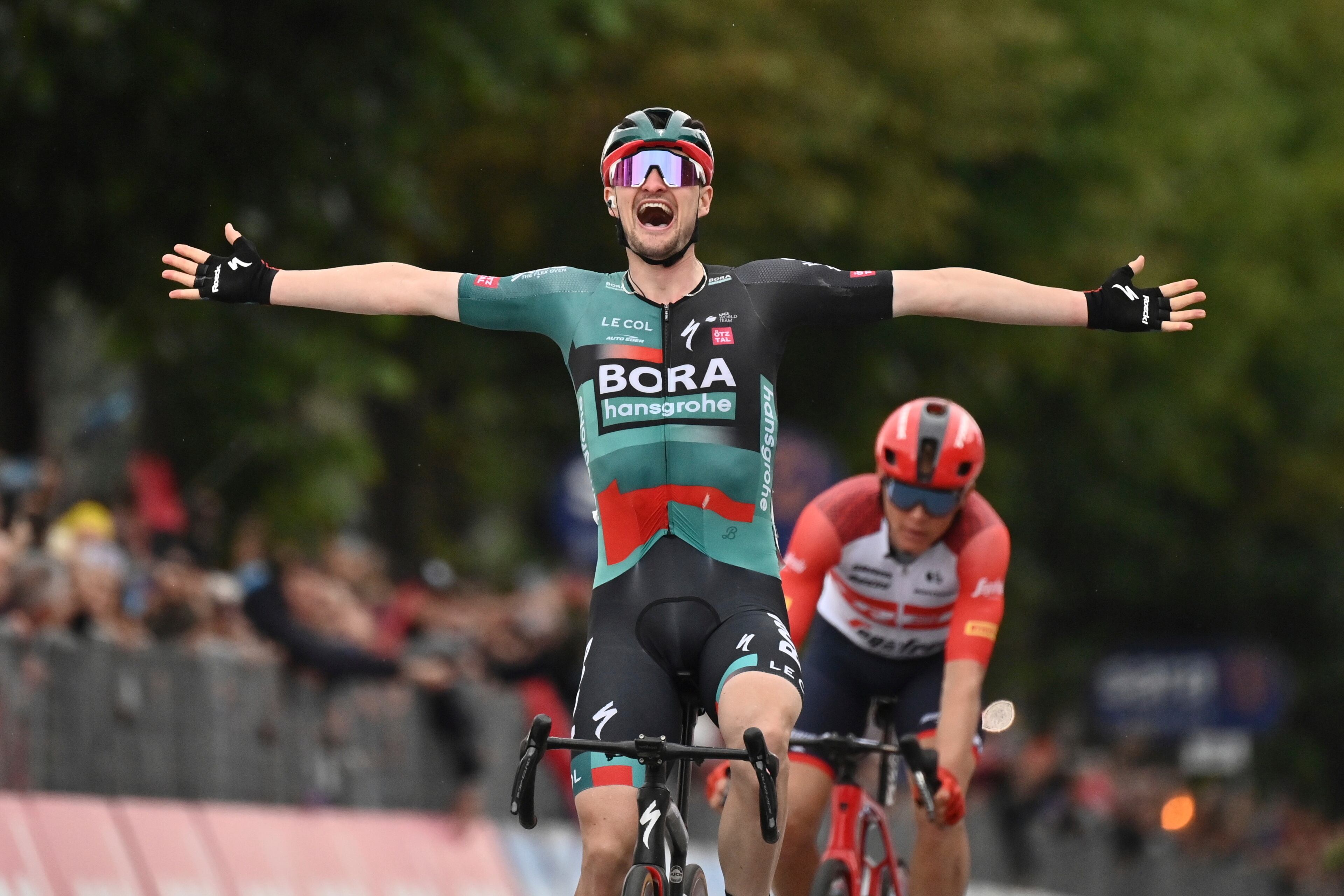 Germany's Nico Denz celebrates winning the 12th stage of the Giro D'Italia, tour of Italy cycling race, from Bra to Rivoli, Thursday, May 18, 2023. (Massimo Paolone/LaPresse via AP)