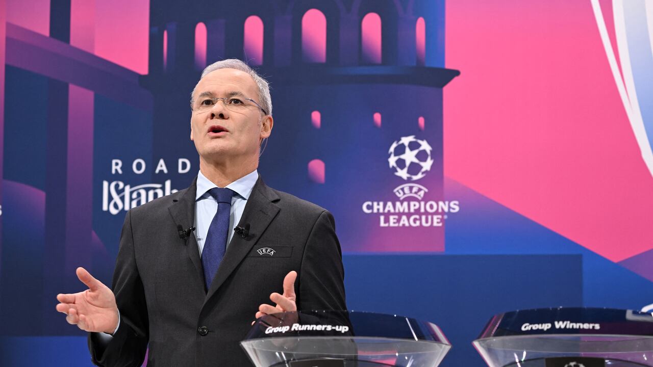 UEFA Deputy General Secretary Giorgio Marchetti introduces the draw for the round of 16 of the 2022-2023 UEFA Champions League football tournament in Nyon on October 7, 2022. (Photo by Fabrice COFFRINI / AFP)