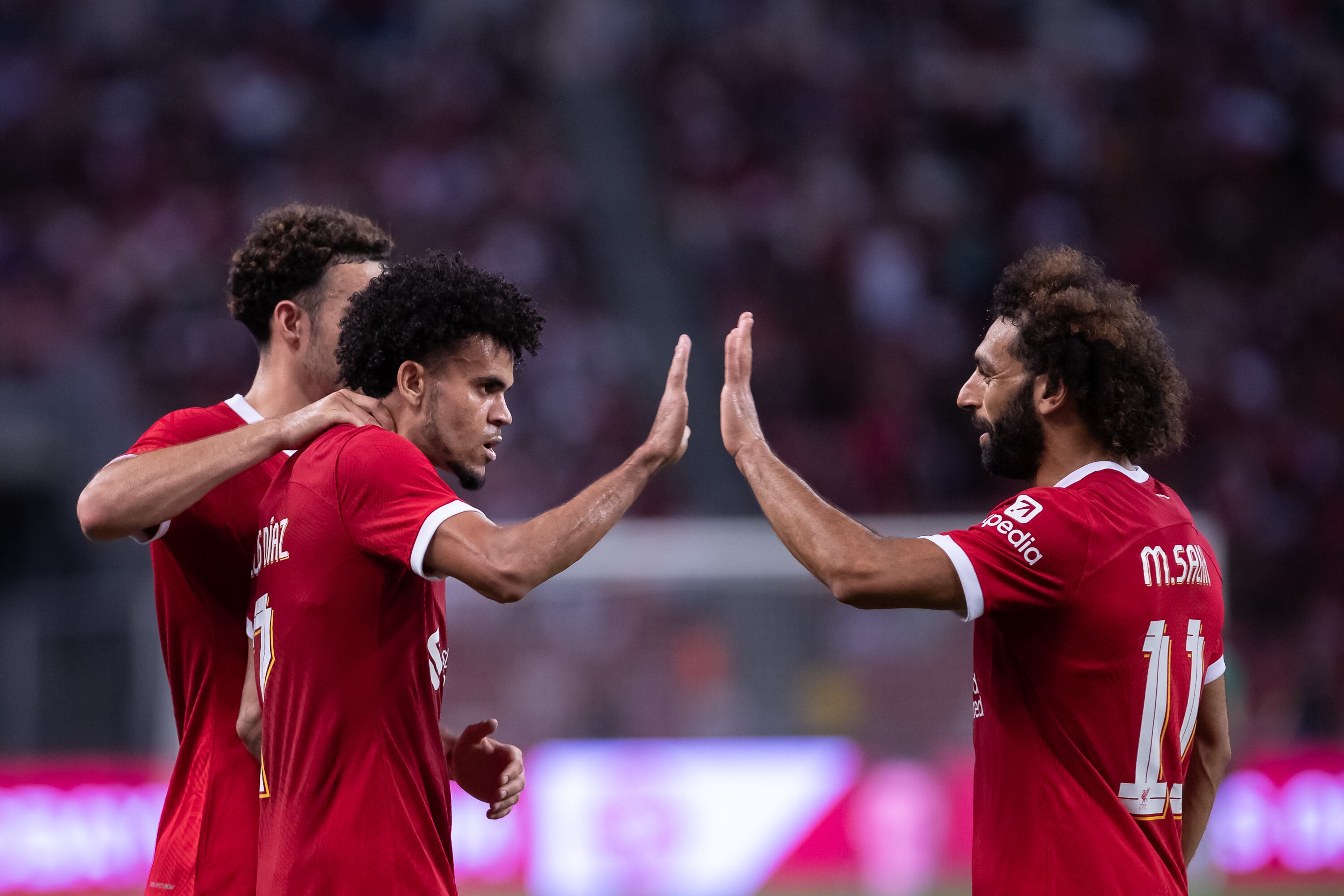 SINGAPORE, SINGAPORE - AUGUST 02: Luis Diaz of Liverpool FC celebrates his goal during the preseason friendly match between Liverpool and Bayern Munich at the National Stadium on August 02, 2023 in Singapore. (Photo by Playmaker/MB Media/Getty Images)
