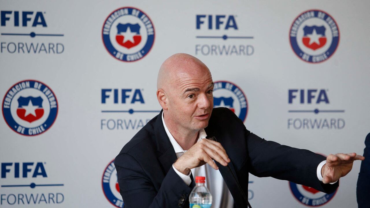 On this handout picture released by Chile's National Professional Football Association (ANFP) FIFA president Gianni Infantino speaks during a press conference in Santiago, on October 17, 2021. Infantino arrived to Santiago on an official visit of 20 hours, in which he will review the news of Chilean football and the projects aimed at developing the football activity.
Carlos PARRA / ANFP / AFP