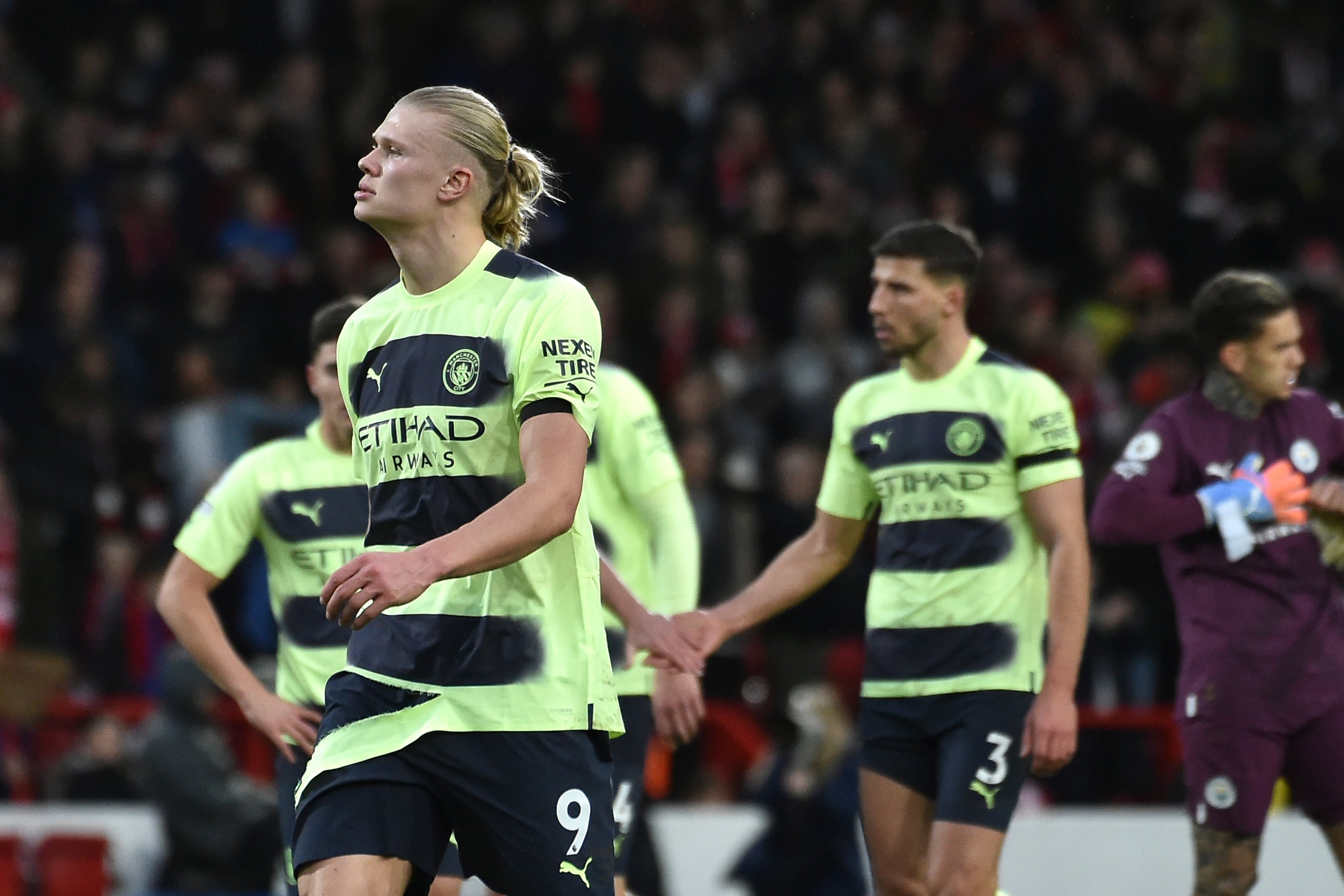 Manchester City's Erling Haaland walks on the pitch at the end of the English Premier League soccer match between Nottingham Forest and Manchester City at City ground in Nottingham, England, Saturday, Feb. 18, 2023. (AP Photo/Rui Vieira)
