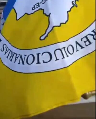 Bandera que cubre el ataúd de alias Guillermino