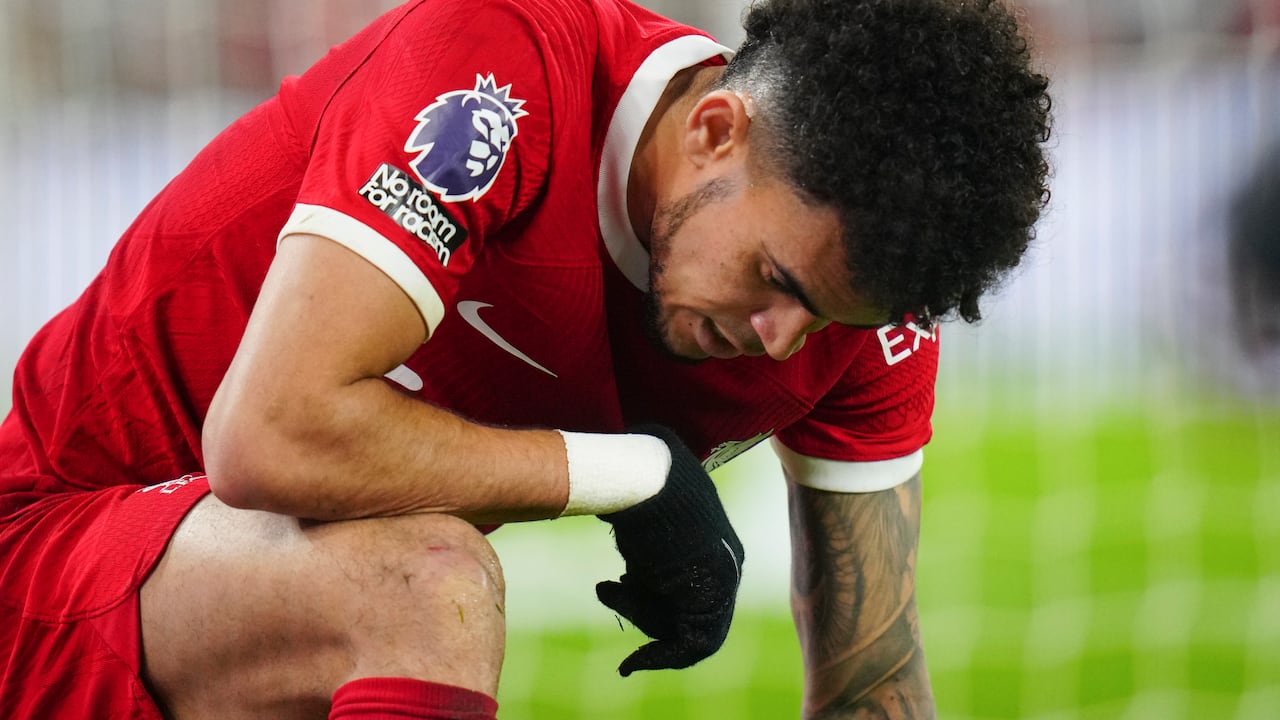 Liverpool's Luis Diaz is dejected after failing to score during the English Premier League soccer match between Liverpool and Luton Town, at Anfield stadium in Liverpool, England, Wednesday, Feb. 21, 2024. (AP Photo/Jon Super)