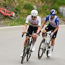 MARTIGNY, SWITZERLAND - APRIL 29: (L-R) Tadej Pogacar of Slovenia and UAE Team Emirates - XRG and Primoz Roglic of Slovenia and Team Red Bull - BORA - hansgrohe compete during the 79th Tour de Romandie 2026, Stage 2 a 171.2km stage from Martigny to Martigny on April 29, 2026 in Martigny, Switzerland. (Photo by Dario Belingheri/Getty Images)