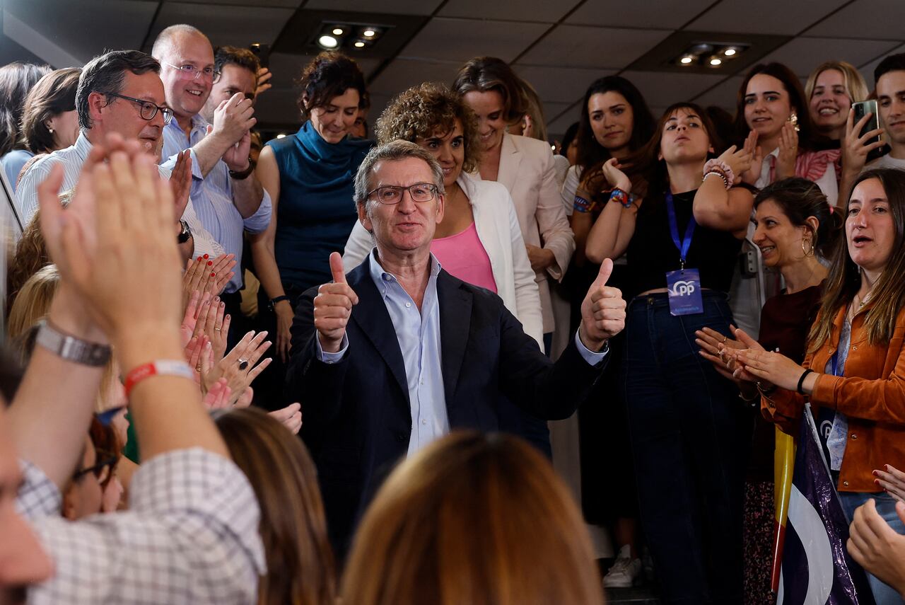 Right-wing opposition party Partido Popular (PP) leader Alberto Nunez Feijoo addresses a press conference after the results of the European Parliament elections, in Madrid on June 9, 2024. Spain's right-wing Popular Party (PP) won today's EU vote in the country, just beating Prime Minister Pedro Sanchez's Socialists, official results showed. With almost all ballots counted, the opposition PP won 22 seats with 34.2 percent of the votes, ahead of the Socialist Party which secured 20 seats after securing 30.2 percent. The far-right Vox came in third, securing six seats, or 9.6 percent of the votes, up from four seats in 2019. (Photo by OSCAR DEL POZO / AFP)