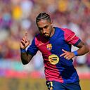 Barcelona's Brazilian forward #11 Raphinha celebrates scoring his team's first goal during the Spanish league football match between FC Barcelona and Real Valladolid FC at the Estadi Olimpic Lluis Companys in Barcelona on August 31, 2024. (Photo by MANU QUINTERO / AFP)
