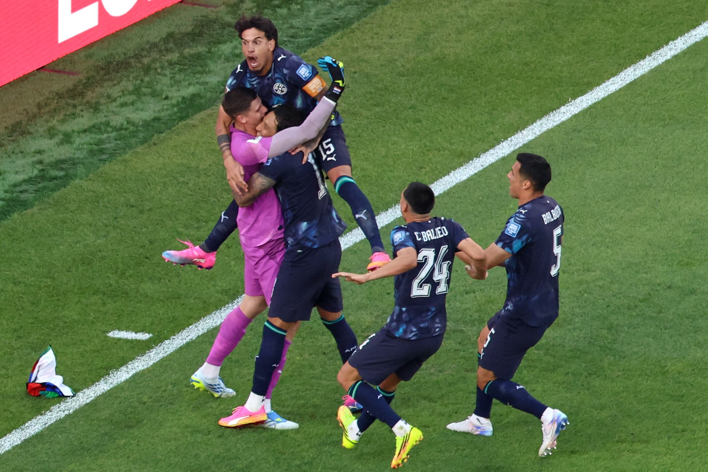 Paraguay players celebrate after a penalty shootout at the end of the World Cup round of 32 soccer match between Germany and Paraguay in Foxborough, Mass., near Boston, Monday, June 29, 2026. (AP Photo/Mark Stockwell)