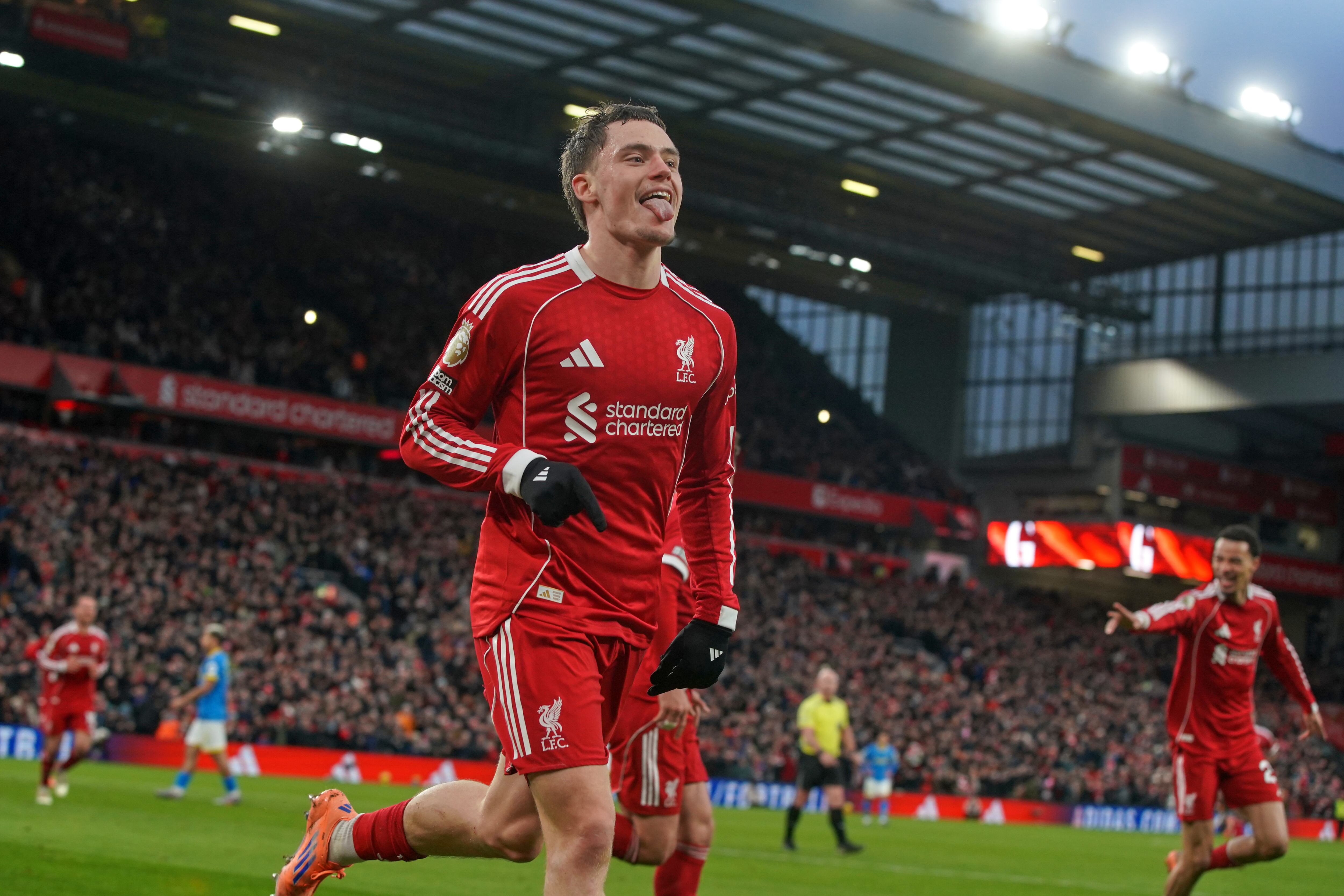 Liverpool's Florian Wirtz celebrates with teammates after scoring his side's second goal during the English Premier League soccer match between Liverpool and Wolverhampton Wanderers in Liverpool, Sunday, Dec. 27, 2025. (AP Photo/Ian Hodgson)