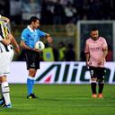 PALERMO, ITALY - APRIL 07: Fabrizio Miccoli (R) of Palermo shows his dejection as Juventus players celebrate victory after the Serie A match between US Citta di Palermo and Juventus FC at Stadio Renzo Barbera on April 7, 2012 in Palermo, Italy. (Photo by Tullio M. Puglia/Getty Images)