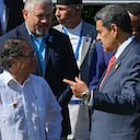 Colombian President Gustavo Petro (L) talks with his Venezuelan counterpart Nicolas Maduro talk during the family photo at the G77+China summit in the Convention Palace in Havana on September 15, 2023. The G77+China, a group of developing and emerging countries representing 80 percent of the global population, gathers Friday in Cuba seeking to promote a "new economic world order" amid warnings of growing polarization. (Photo by ADALBERTO ROQUE / AFP)