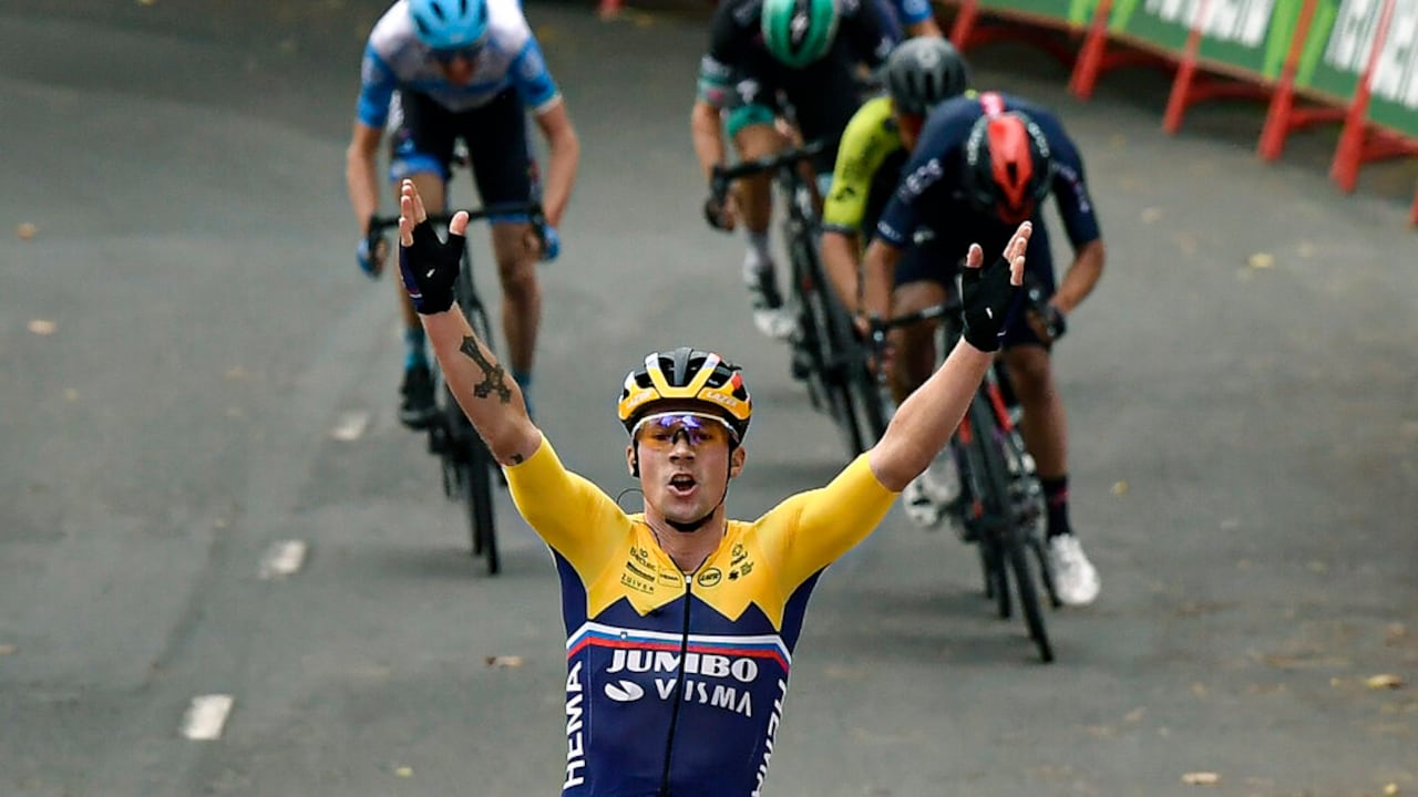 Jumbo-Visma's Primoz Roglic, celebrates after winning the first stage of La Vuelta between Irun and Arrate, in northern Spain, Tuesday, Oct. 20, 2020. Defending champion Roglic attacked in the final kilometer after a difficult climb to win the opening stage of the Spanish Vuelta. (AP Photo/Alvaro Barrientos)