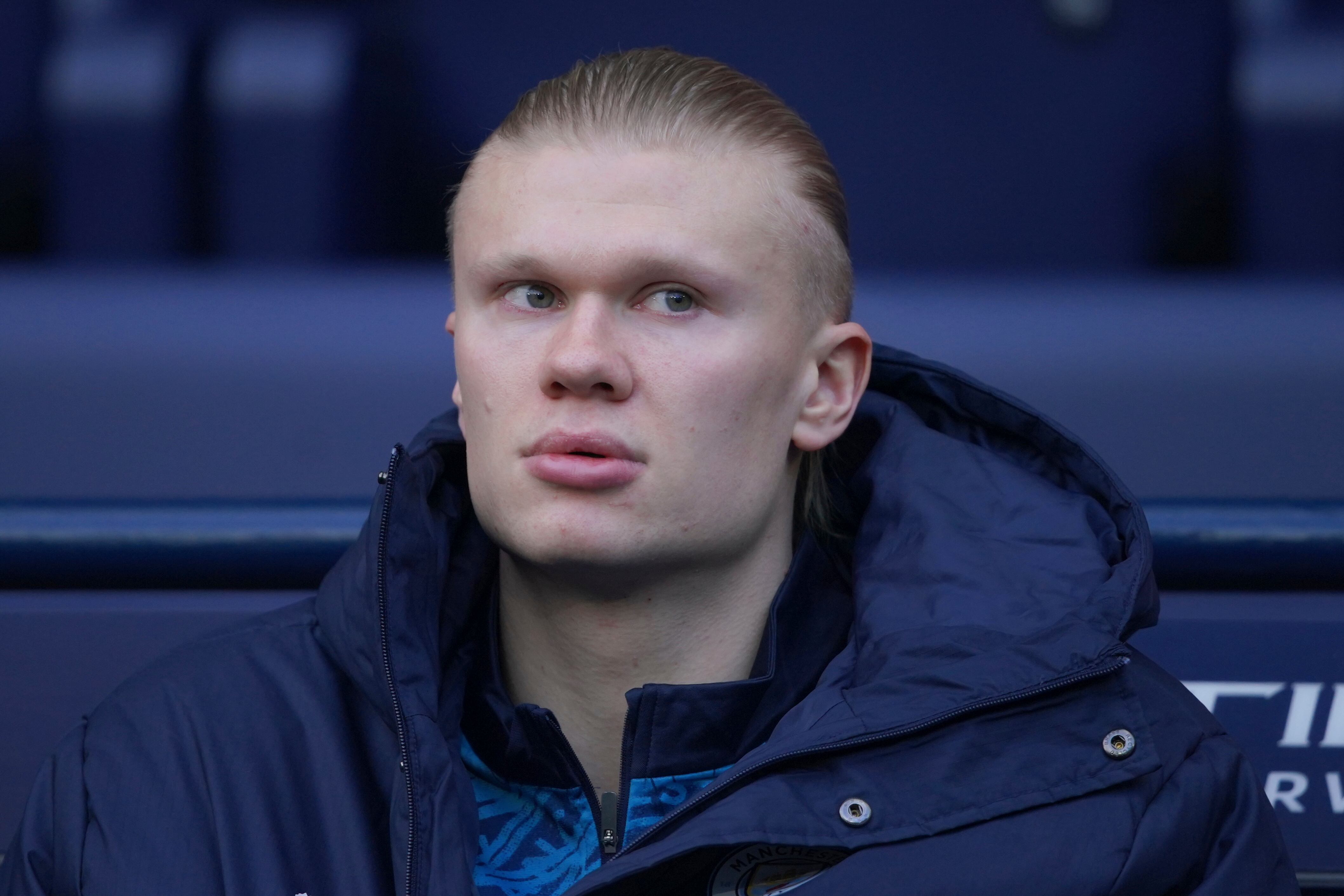 Manchester City's Erling Haaland sits in the dug out before the start of the English Premier League soccer match between Manchester City and Wolverhampton Wanderers in Manchester, England, Saturday, Jan. 24, 2026. (AP Photo/Ian Hodgson)