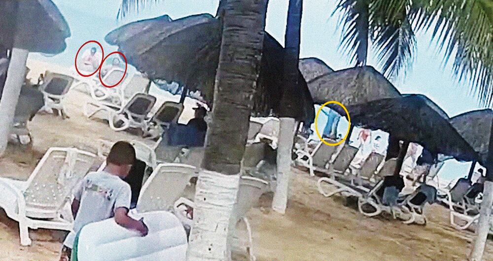  Mientras toman el sol, criminales dan aviso para el asesinato.