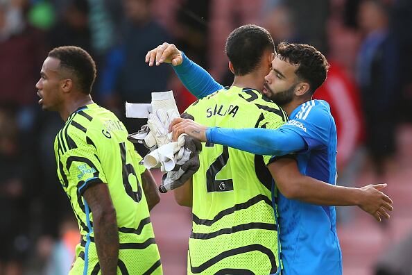 BOURNEMOUTH, ENGLAND - SEPTEMBER 30: William Saliba of Arsenal celebrates with teammate David Raya following the team's victory during the Premier League match between AFC Bournemouth and Arsenal FC at Vitality Stadium on September 30, 2023 in Bournemouth, England. (Photo by Steve Bardens/Getty Images)