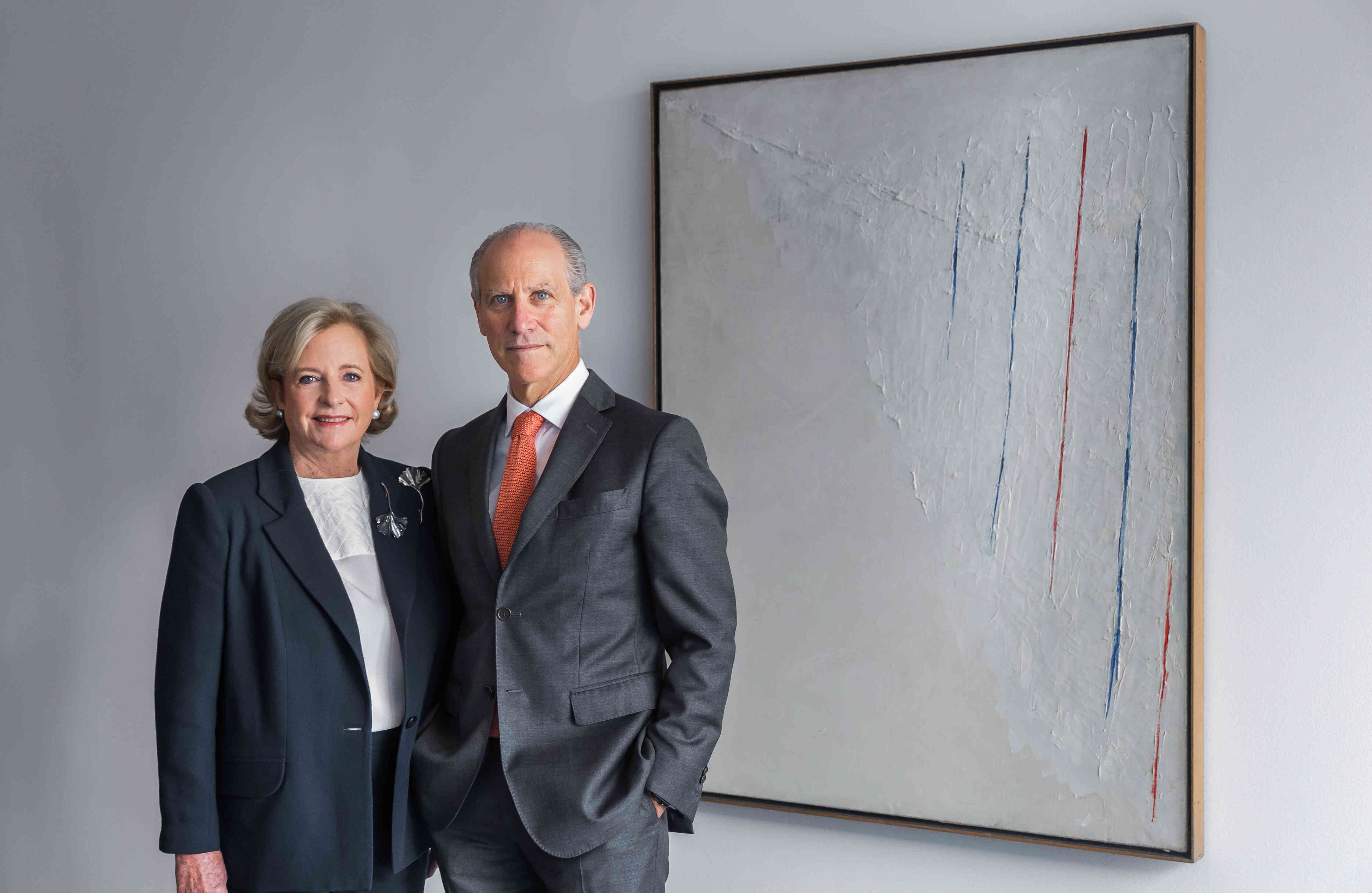 C. Patricia Phelps de Cisneros and Glenn D. Lowry, Director, The Museum of Modern Art, stand next to Alejandro Otero.