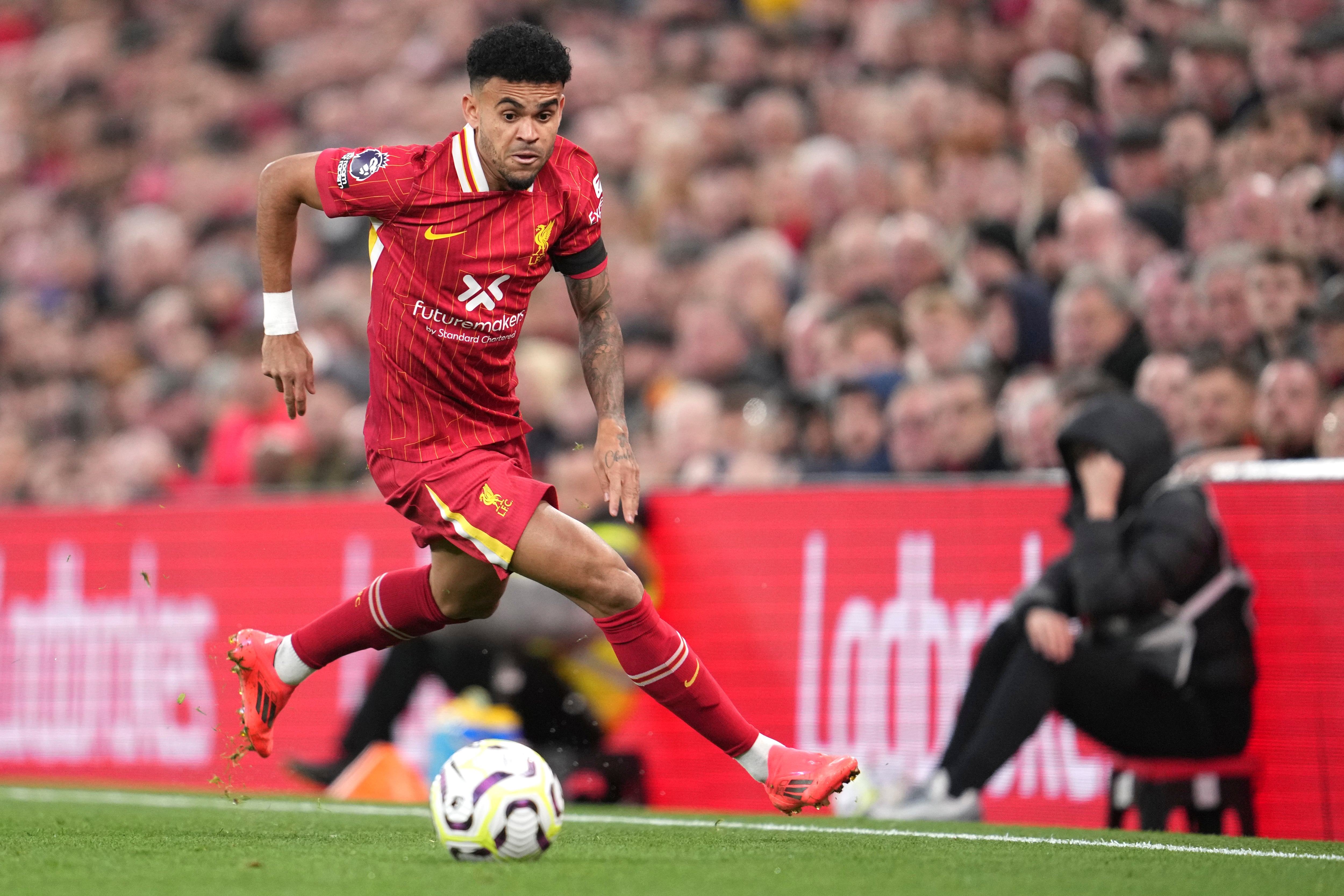 Liverpool's Luis Diaz in action during the English Premier League soccer match between Liverpool and Chelsea at Anfield Stadium, Liverpool, England, Sunday, Oct. 20, 2024. (AP Photo/Jon Super)