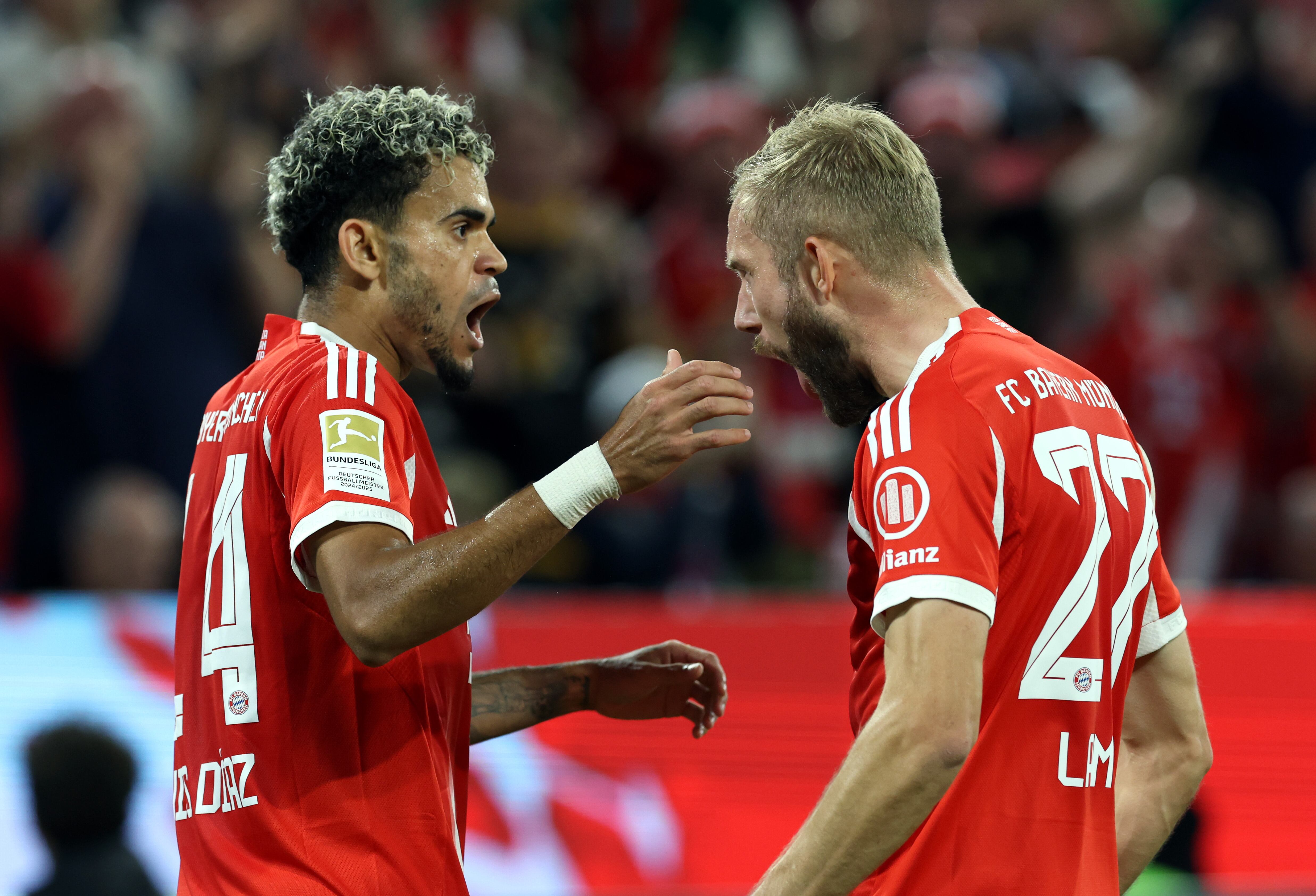 MUNICH, GERMANY - AUGUST 22: Luis Diaz of Bayern Munich celebrates scoring his team's second goal with teammate Konrad Laimer during the Bundesliga match between FC Bayern München and RB Leipzig at Allianz Arena on August 22, 2025 in Munich, Germany. (Photo by Alexander Hassenstein/Getty Images)