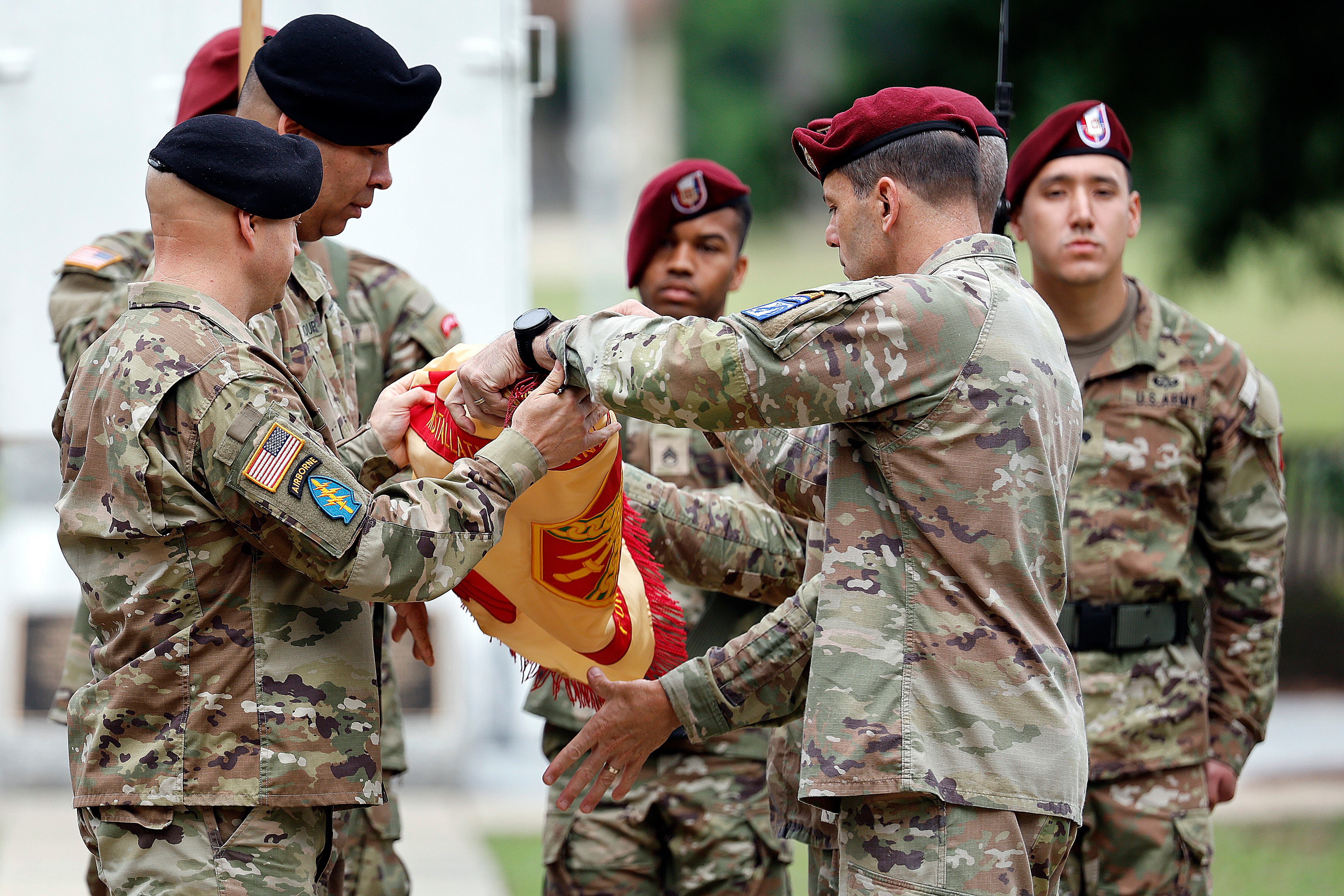 Lt. Gen. Christopher T. Donahue, front right, takes part of the Casing of the Colors