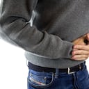 Dolor de estómago, problemas gastrointestinales, problemas digestivos, espasmos, imagen de referencia.