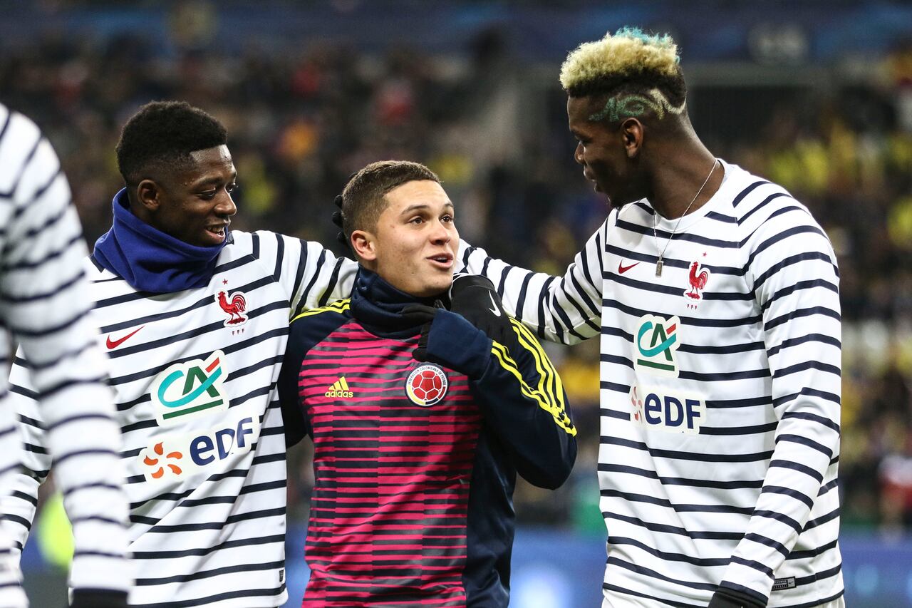 Dembélé (izq.) y Quintero (centro) en un amistoso de Francia contra Colombia (2018).