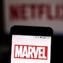 BRAZIL - 2019/08/16: In this photo illustration the Marvel logo is seen displayed on a smartphone and logo Netflix on the blurred background. (Photo Illustration by Rafael Henrique/SOPA Images/LightRocket via Getty Images)