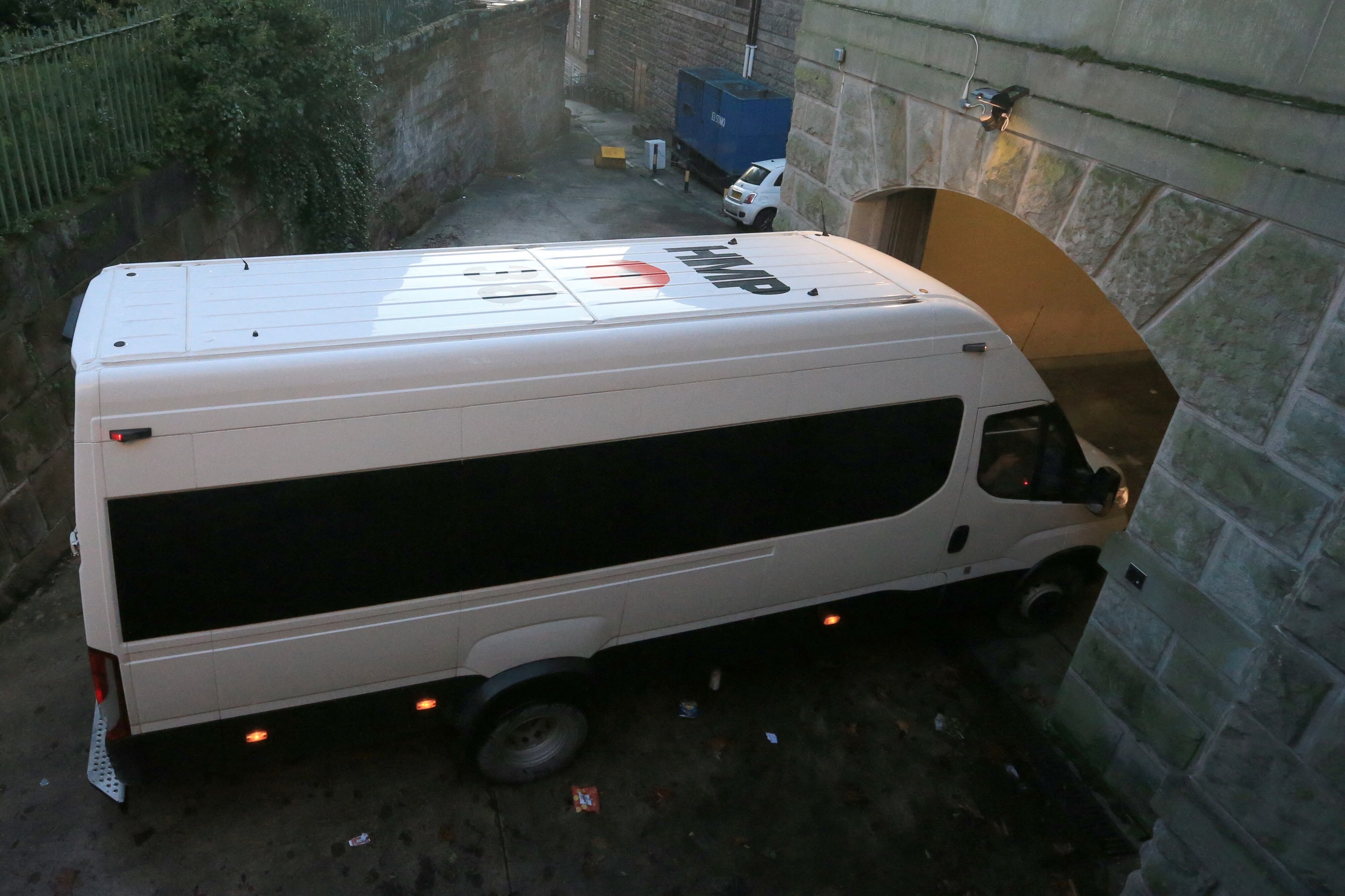 A van believed to be transporting Manchester City's French defender Benjamin Mendy arrives at Chester Crown Court in Chester, northwest England on January 7, 2022. Manchester City and France international footballer Benjamin Mendy, who is making an application for bail, is charged with seven counts of rape and one count of sexual assault.
Lindsey Parnaby / AFP