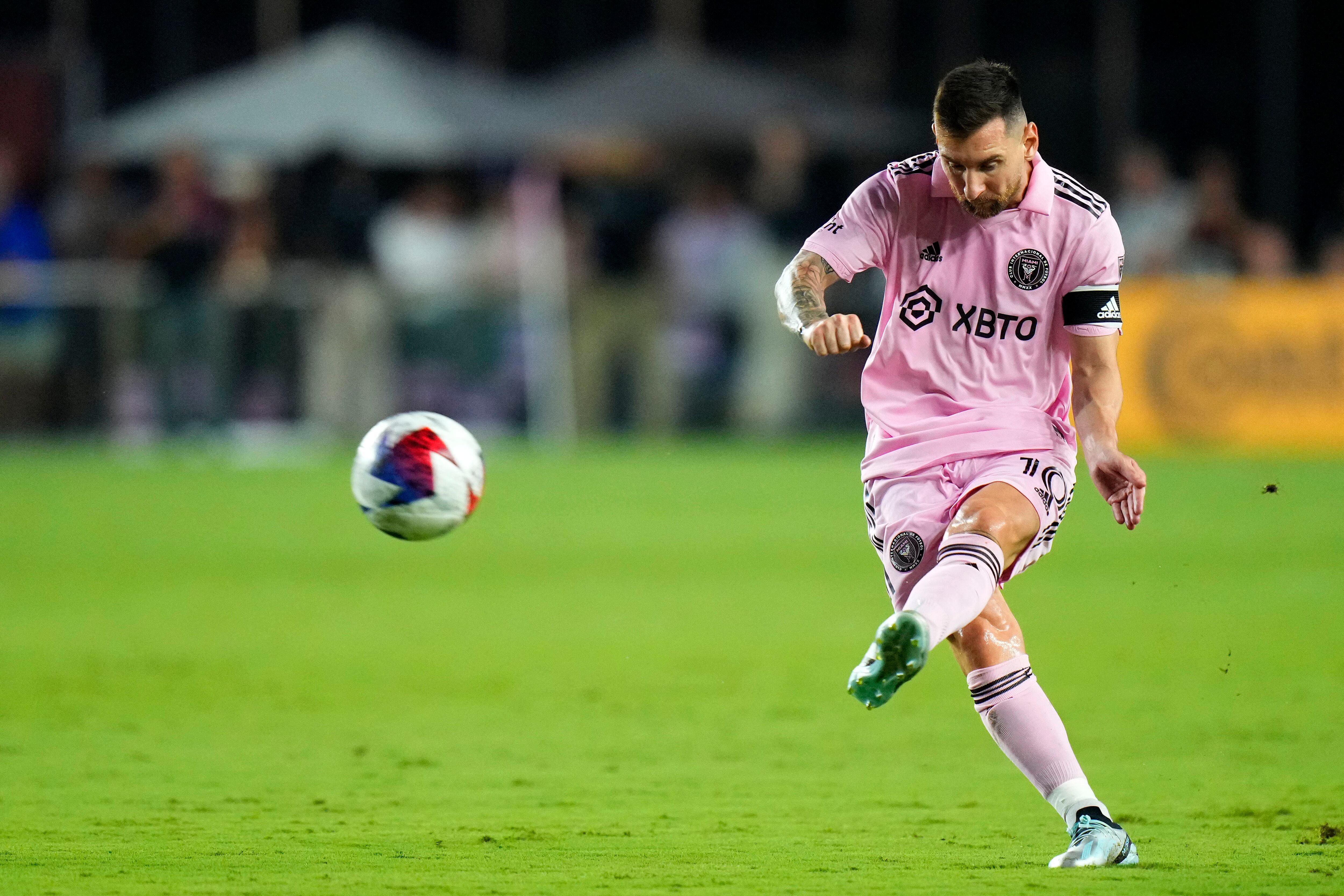 Aug 30, 2023; Fort Lauderdale, Florida, USA; Inter Miami forward Lionel Messi (10) shoots the ball against Nashville SC  during the first half at DRV PNK Stadium. Mandatory Credit: Rich Storry-USA TODAY Sports
