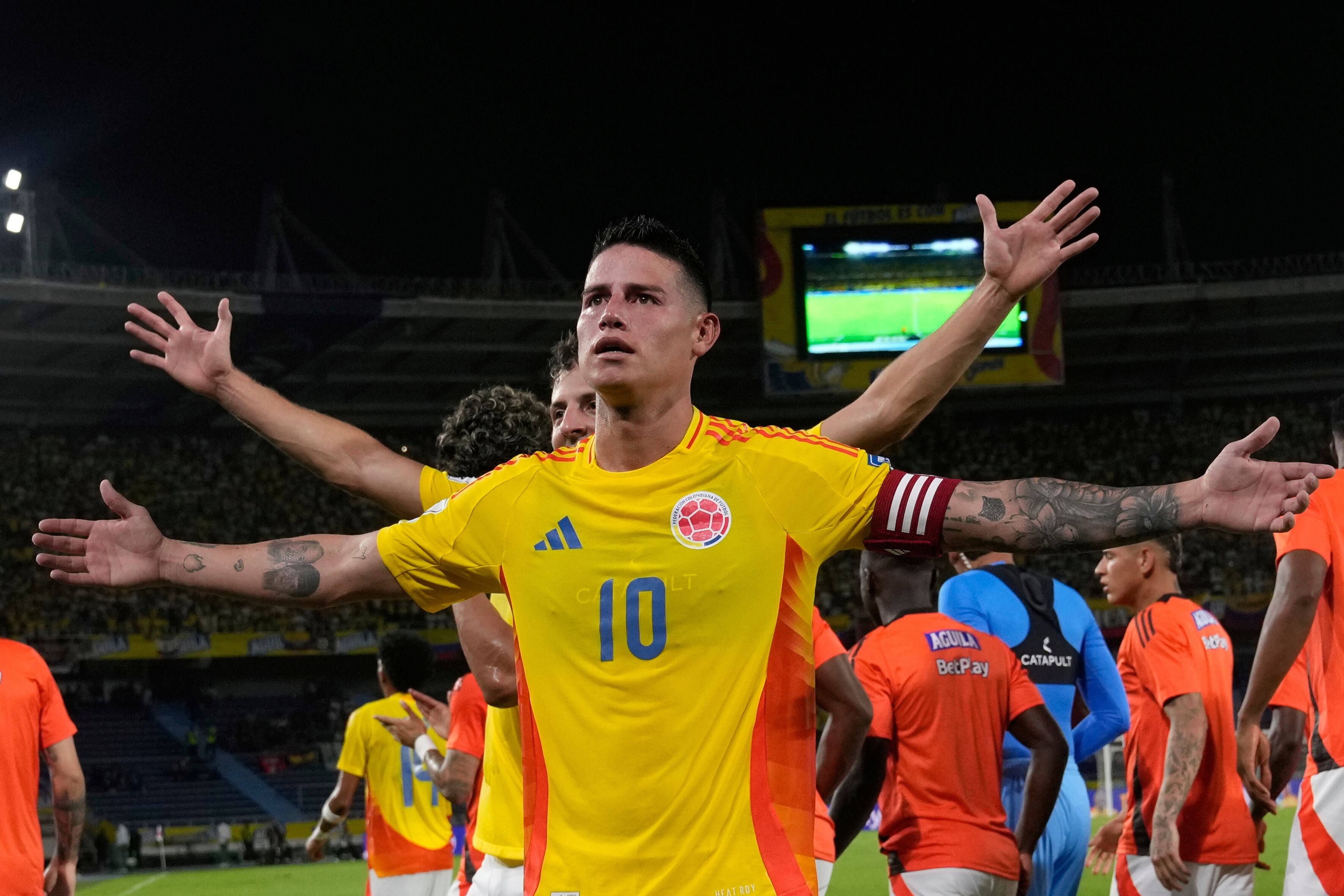 Colombia's James Rodriguez celebrates after scoring his side's opening goal against Bolivia during a World Cup 2026 qualifying soccer match at Metropolitano stadium in Barranquilla, Colombia, Thursday, Sept. 4, 2025. (AP Photo/Fernando Vergara)