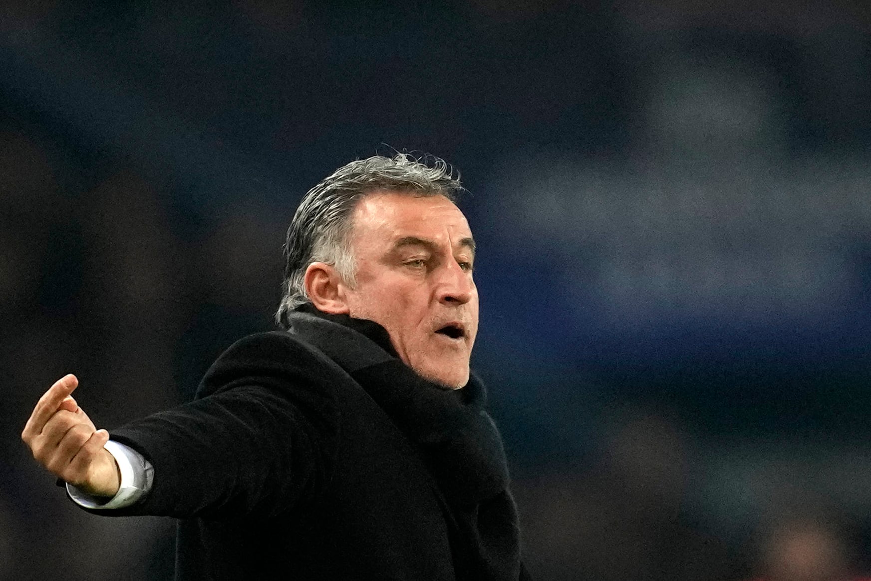 PSG's head coach Christophe Galtier gives instructions to his players during the Champions League round of 16 first leg soccer match between Paris Saint Germain and Bayern Munich, at the Parc des Princes stadium, in Paris, France, Tuesday, Feb. 14, 2023. (AP Photo/Christophe Ena)