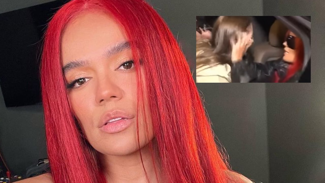 Karol G consolando a una fan.