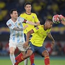 Argentina's Lionel Messi (L), Colombia's William Tesillo and Colombia's goalkeeper David Ospina vie for the ball during their South American qualification football match for the FIFA World Cup Qatar 2022 at the Roberto Melendez Metropolitan Stadium in Barranquilla, Colombia, on June 8, 2021.
Raul ARBOLEDA / AFP