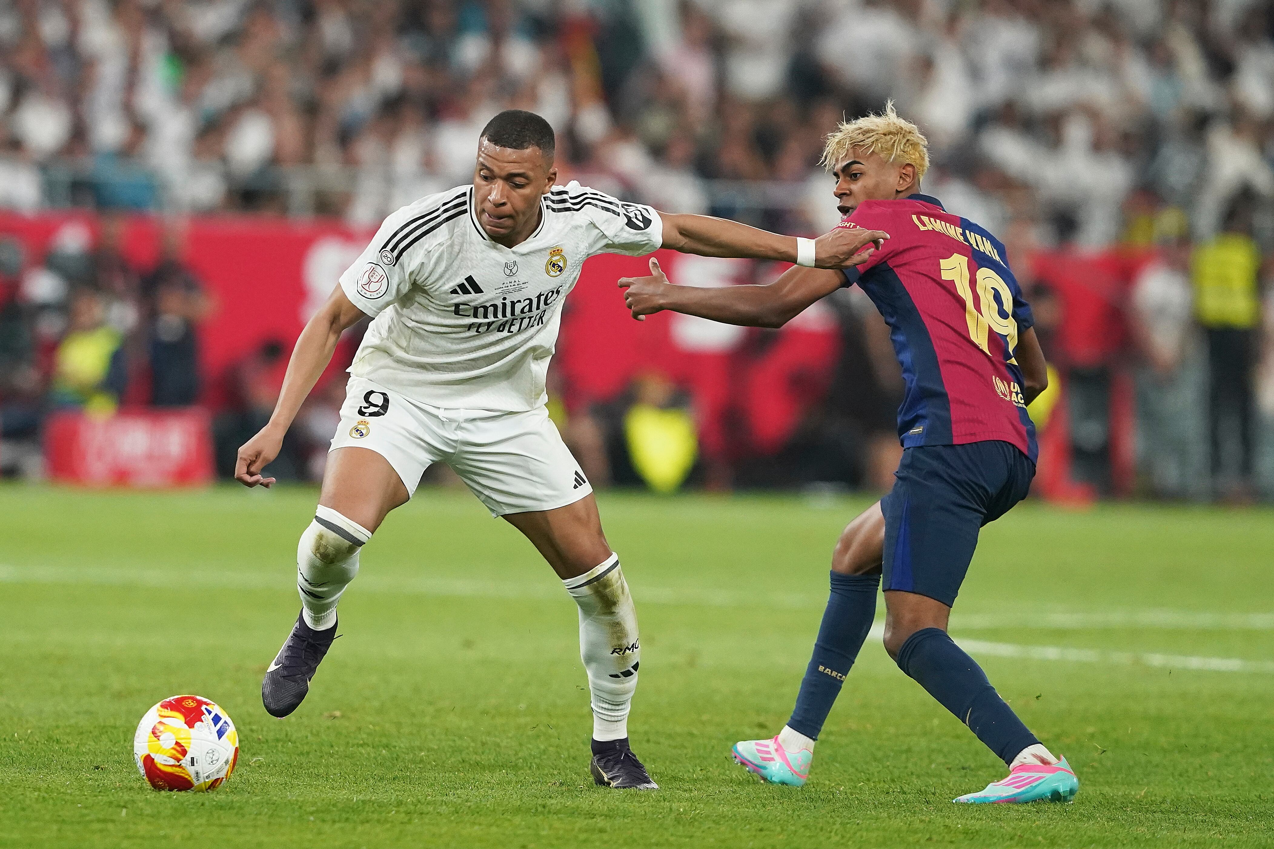 Seville, Spain - April 26: Kylian Mbappe of Real Madrid CF and Lamine Yamal of FC Barcelona battle for the ball during the Copa del Rey Final macht between FC Barcelona and Real Madrid at Estadio de La Cartuja on April 26, 2025 in Seville, Spain. (Photo by Manu Reino/DeFodi Images/DeFodi via Getty Images)