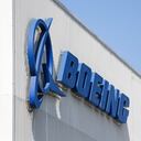 (FILES) In this file photo taken on April 20, 2020 the Boeing logo is pictured at its Renton Factory in Renton, Washington. - US plane maker Boeing reached a pair of major agreements with Qatar Airways, including the sale of 34 777X freighters worth an estimated $20 billion, the White House announced on January 31,2022. Besides the 34 planes, Qatar Airways also has purchase rights for another 16 777X cargo planes. (Photo by Jason Redmond / AFP)