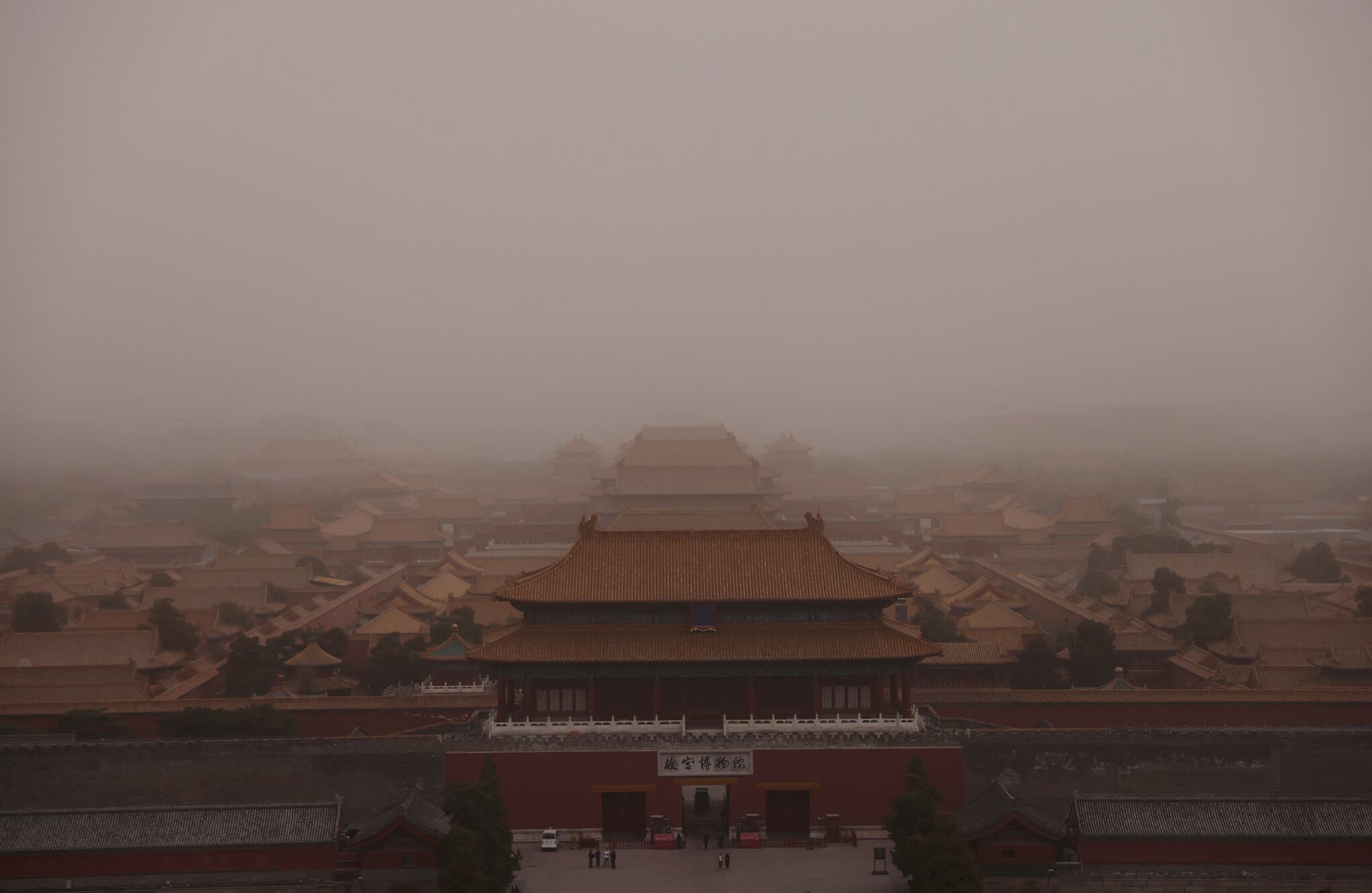 En imágenes : Tormenta de arena y contaminación en los cielos de Beijing