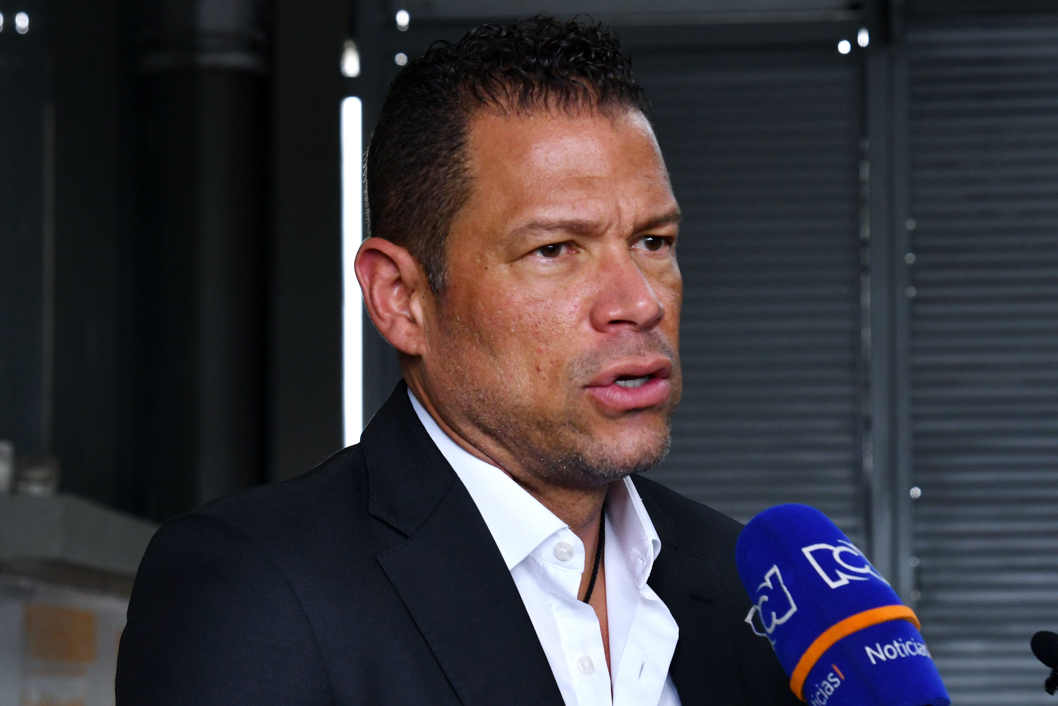 CALI, COLOMBIA - APRIL 16: Former Colombian football player Oscar Cordoba speaks to the press as he arrives to the public wake for former football star Freddy Rincon at Estadio Pascual Guerrero on April 16, 2022 in Cali, Colombia. Freddy Rincon died aged 55 after suffering a traffic accident that had him hospitalized for four days. The city of Cali declared a three day mourning period. (Photo by Nelson Rios/Vizzor Image/Getty Images)